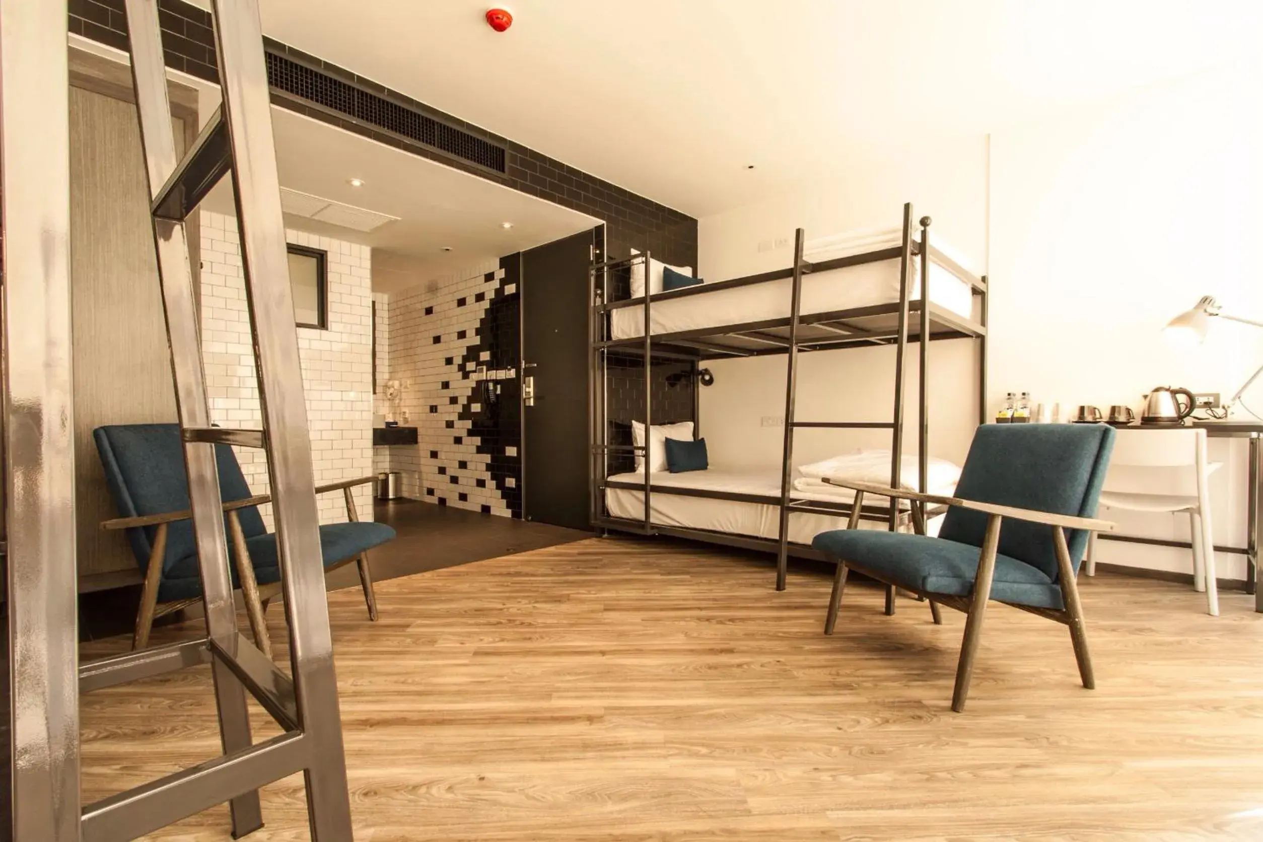 Photo of the whole room, Bunk Bed in Klub Hotel - Sha Plus Certified