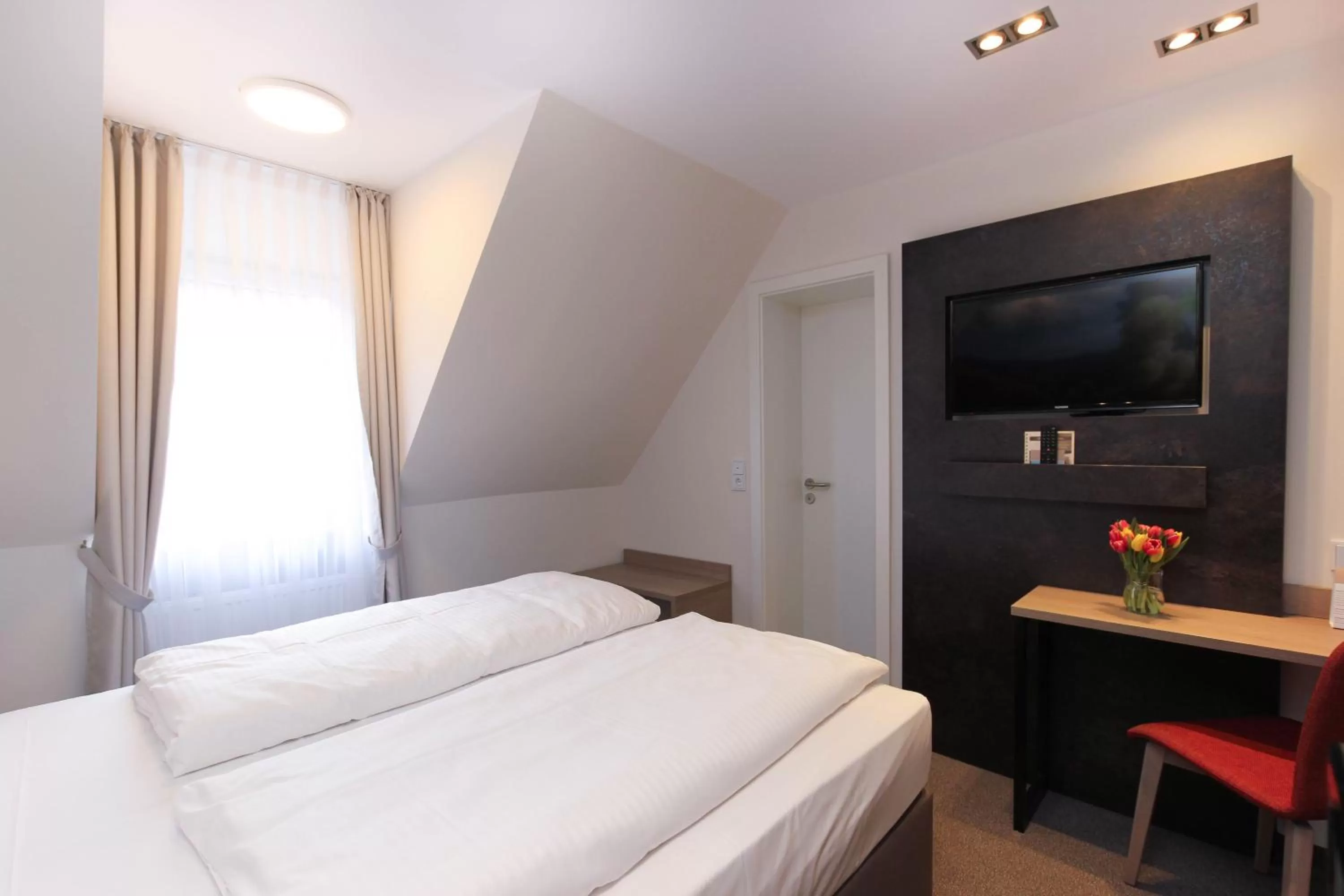 Bed in City Hotel Würzburg