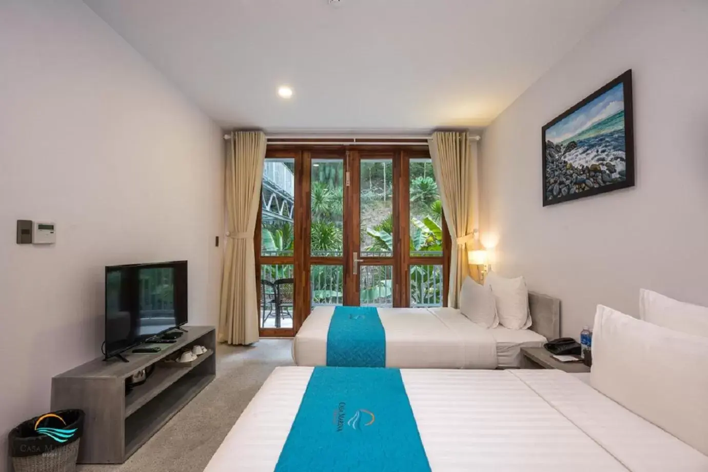 Bed, Pool View in Casa Marina Resort