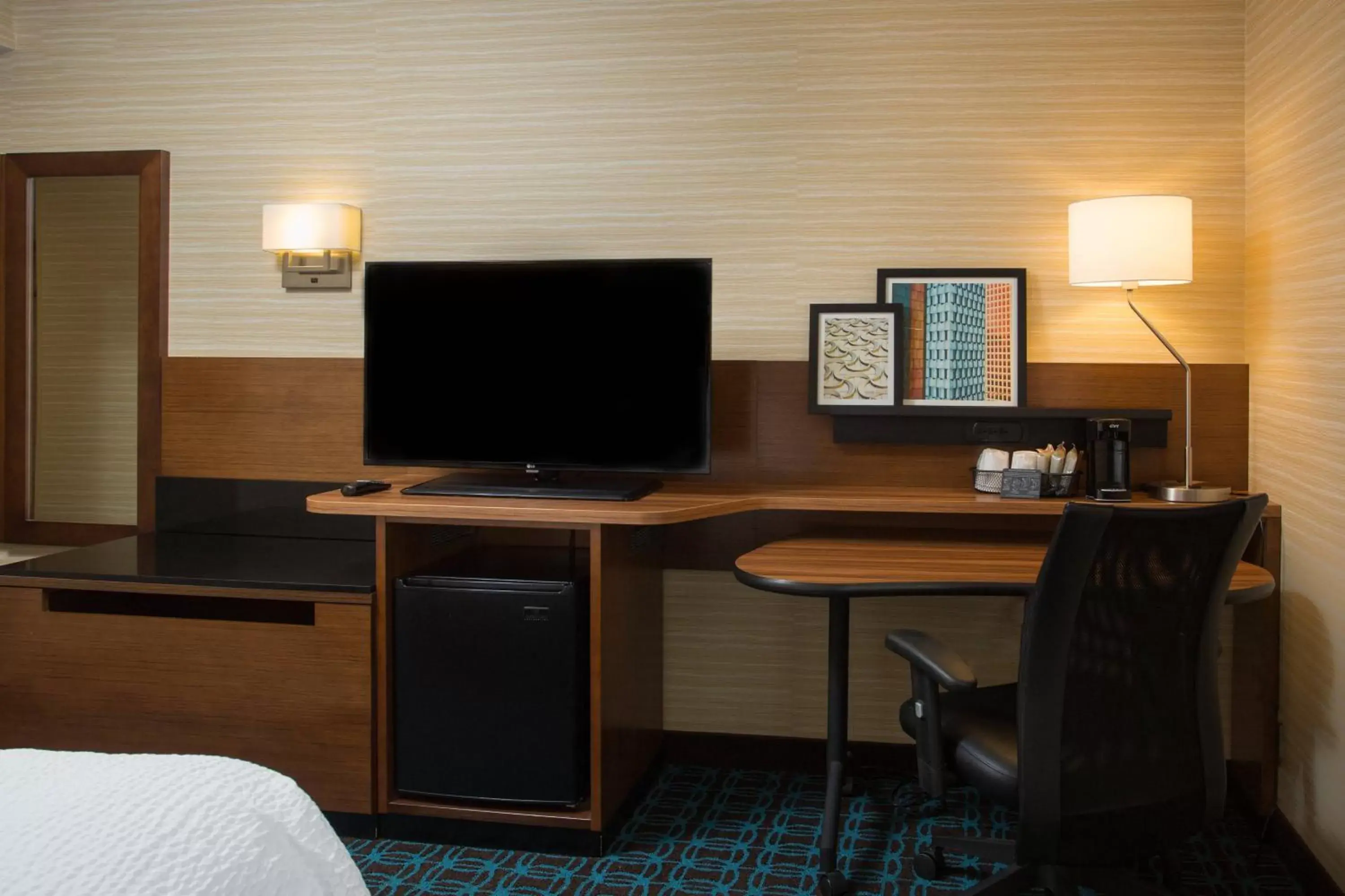 Photo of the whole room, TV/Entertainment Center in Fairfield Inn Manchester - Boston Regional Airport