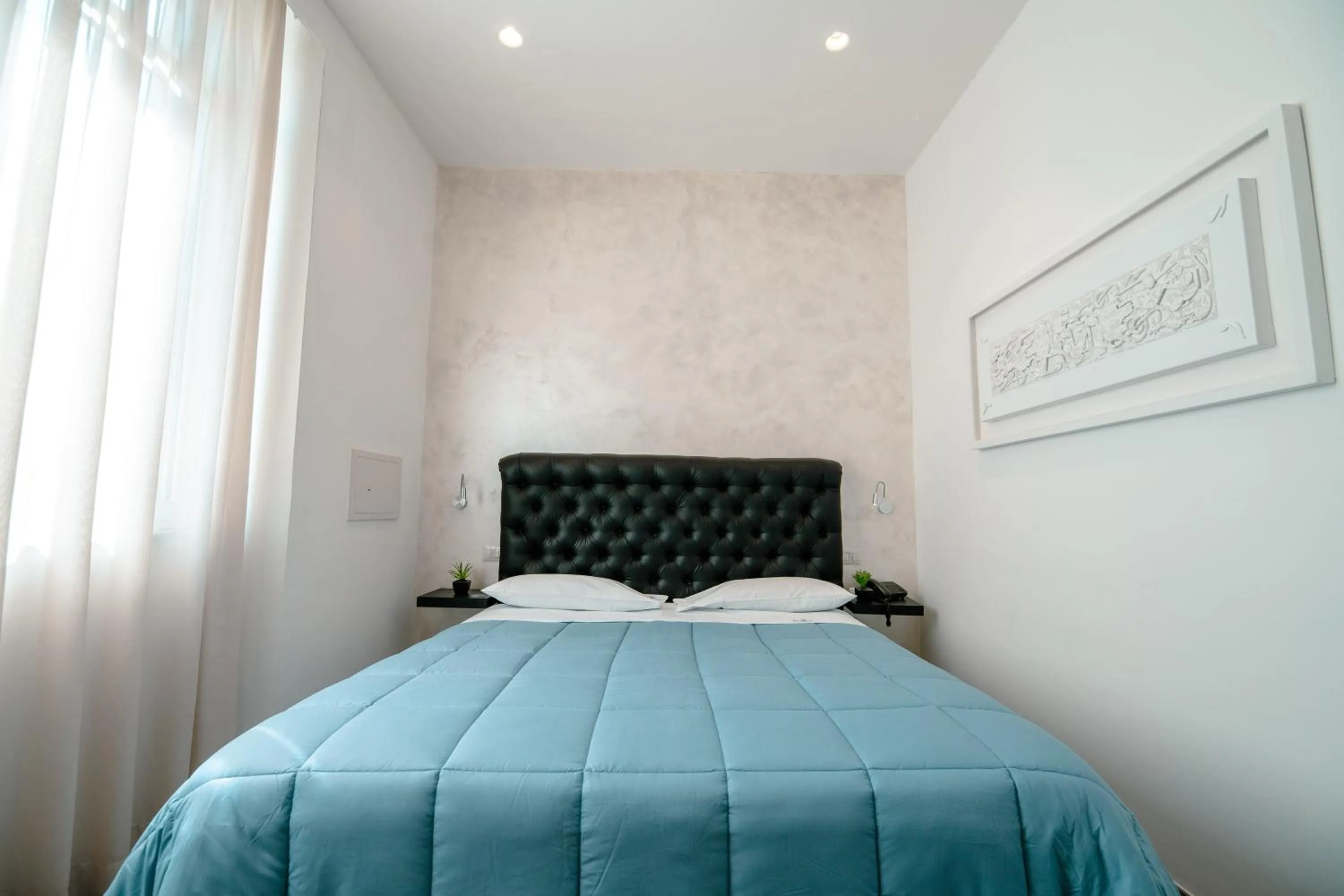 Photo of the whole room, Bed in Hotel Bruman Salerno