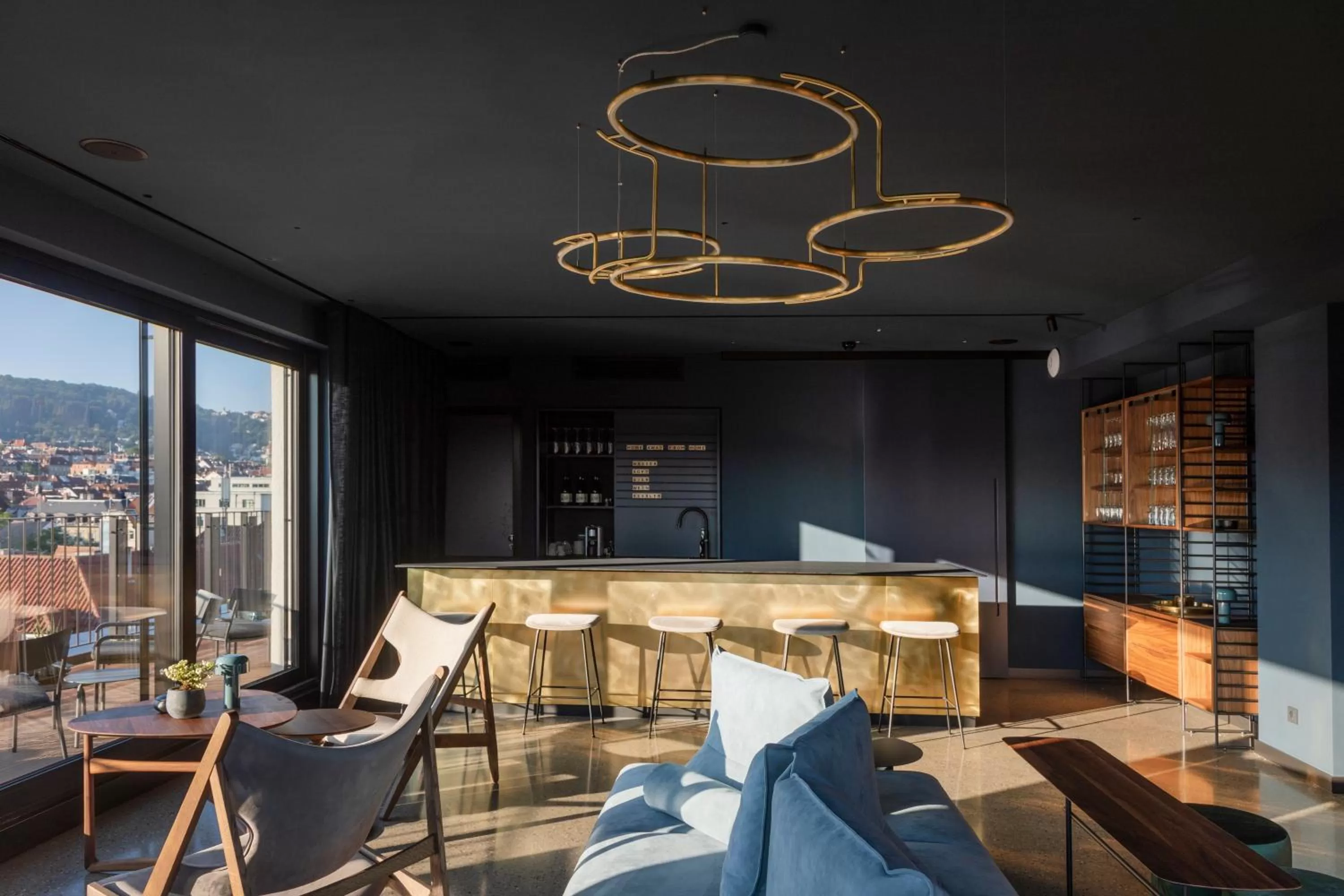 Communal lounge/ TV room in EmiLu Design Hotel