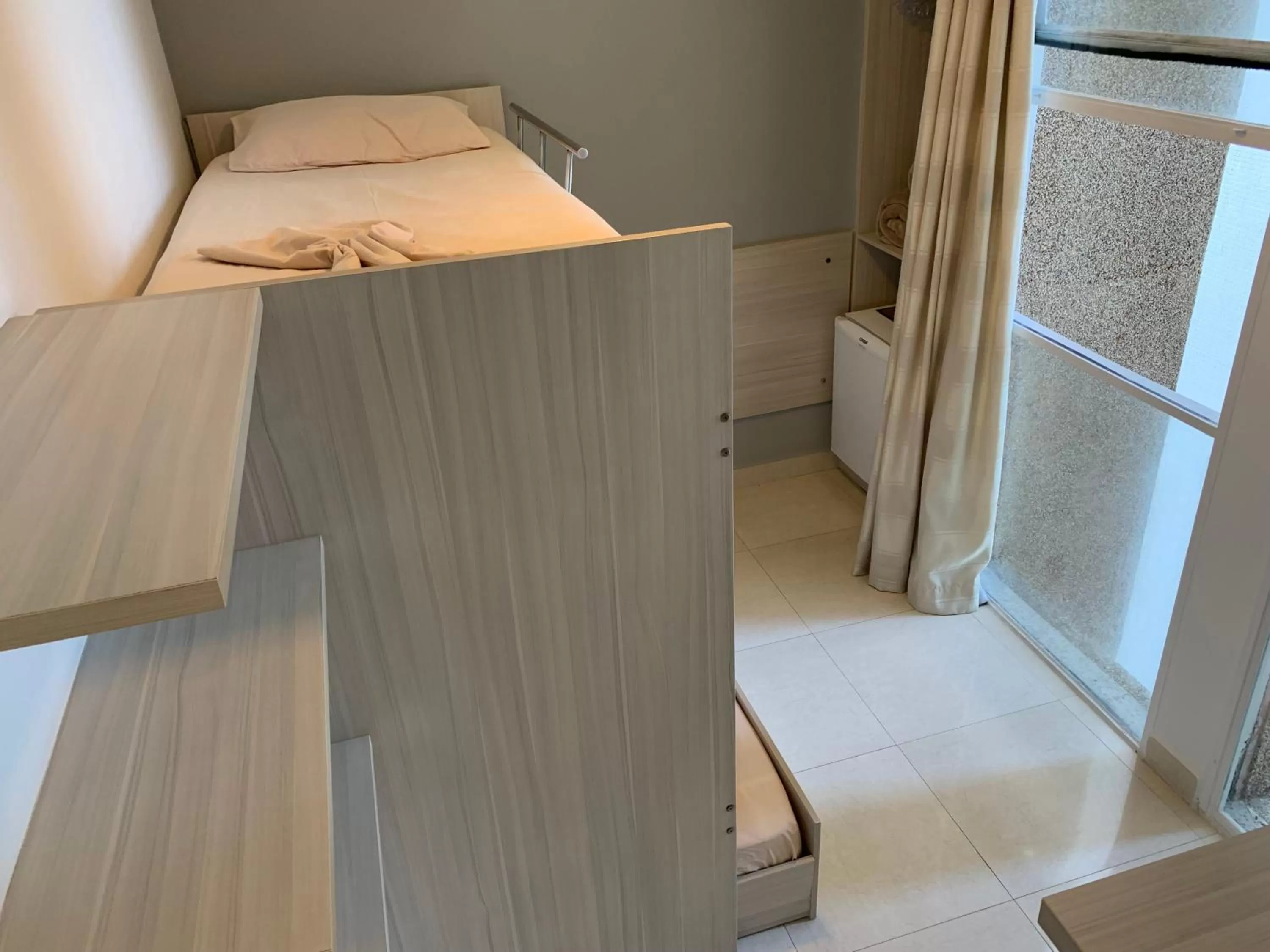 Bed in Grand Hotel Guarujá - A sua Melhor Experiência Beira Mar na Praia!