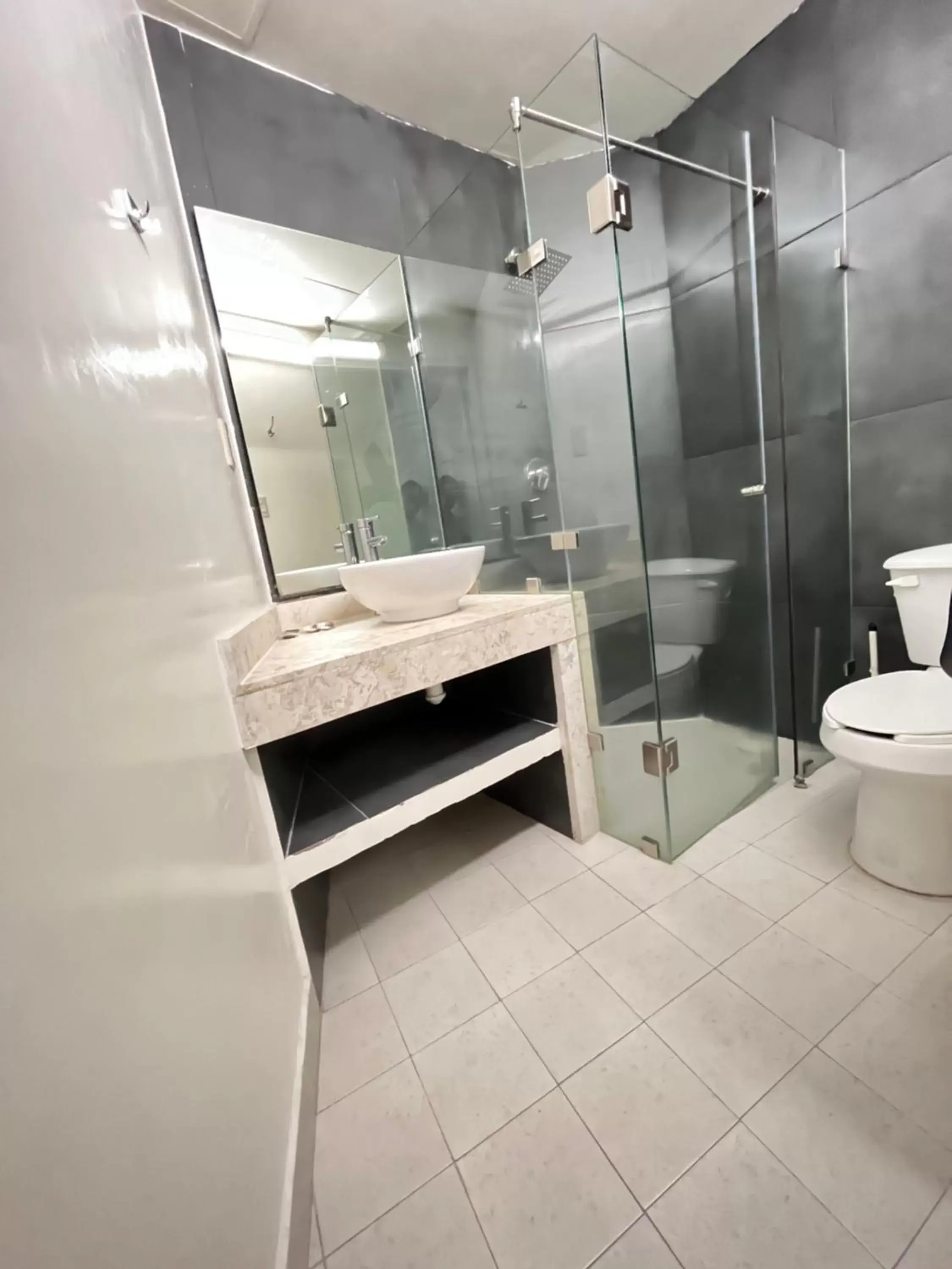 Bathroom in Genesis Suites / Lofts