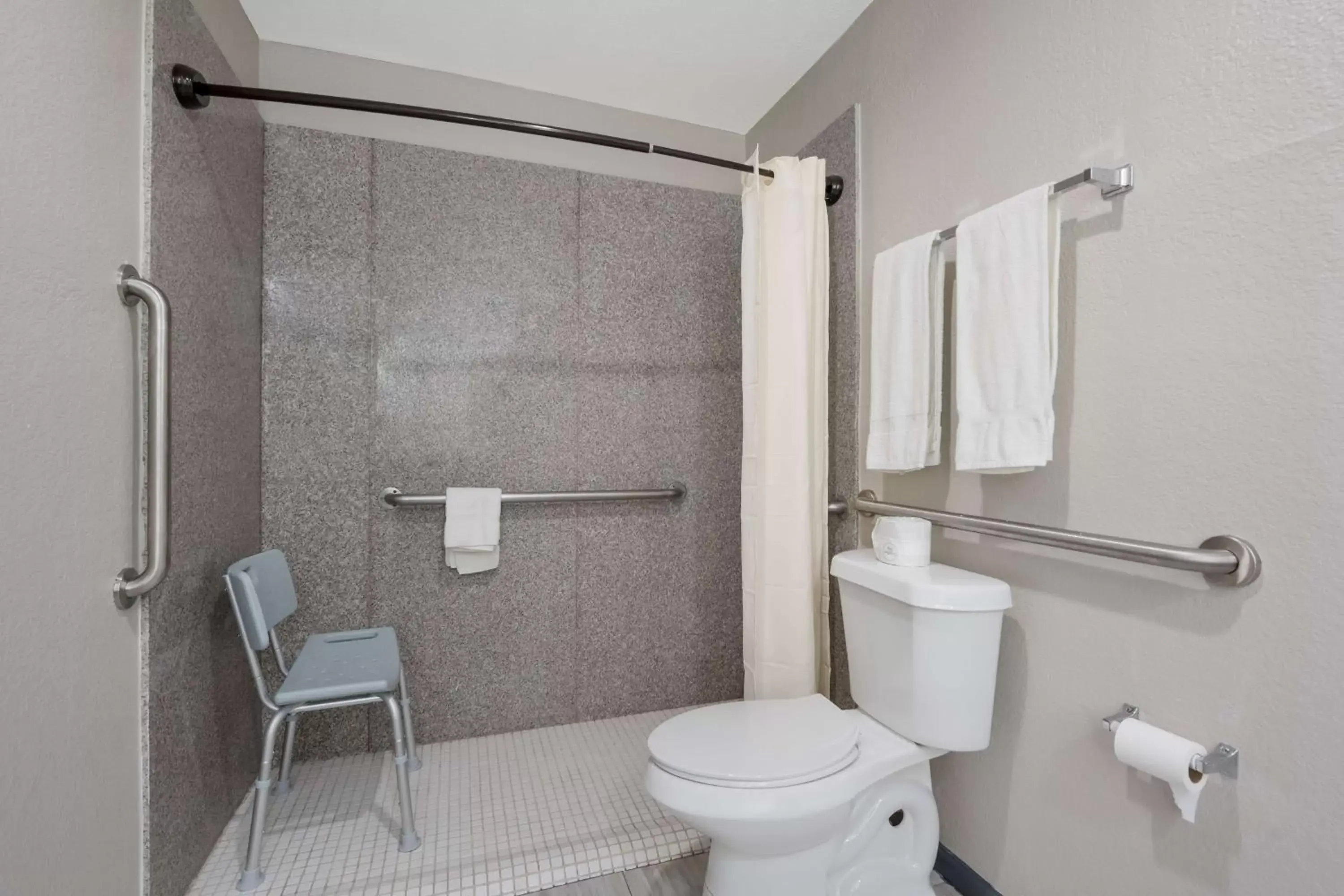 Bathroom in SureStay Hotel by Best Western Spring North Houston