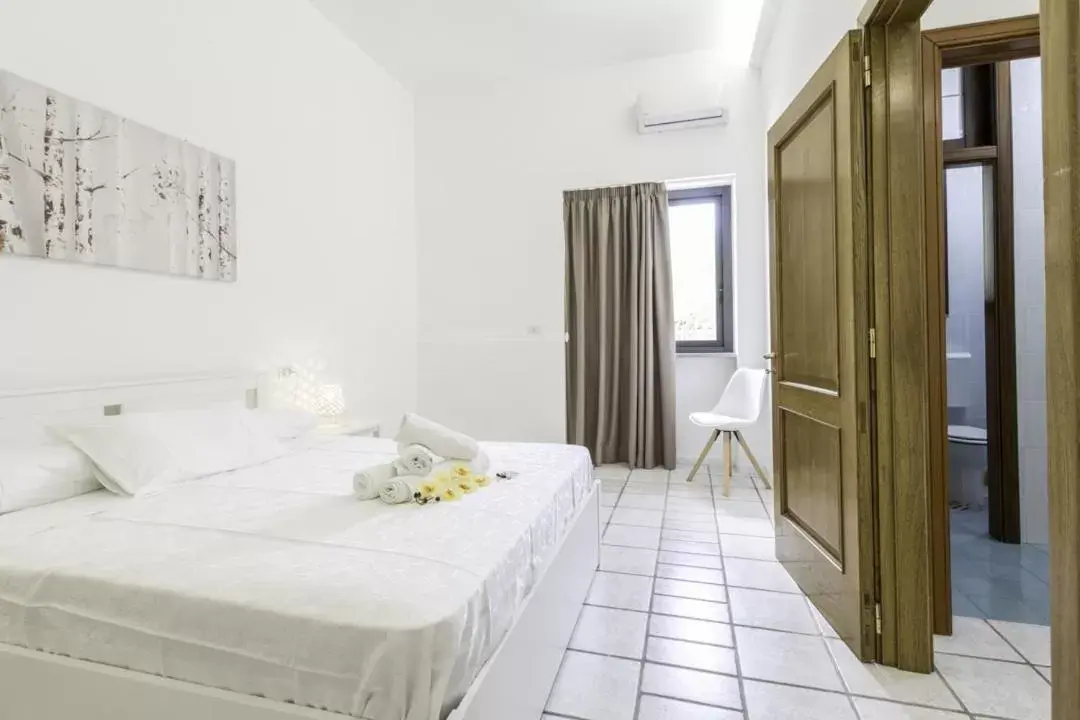 Bed in La Gemma del Salento Rooms&Apartments