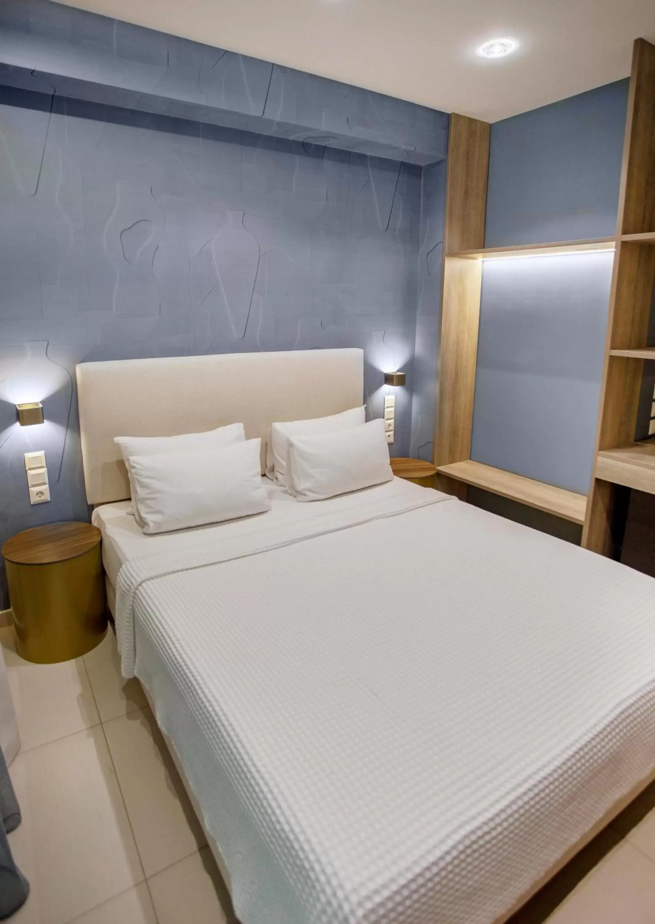 Bed in Phidias Piraeus Hotel