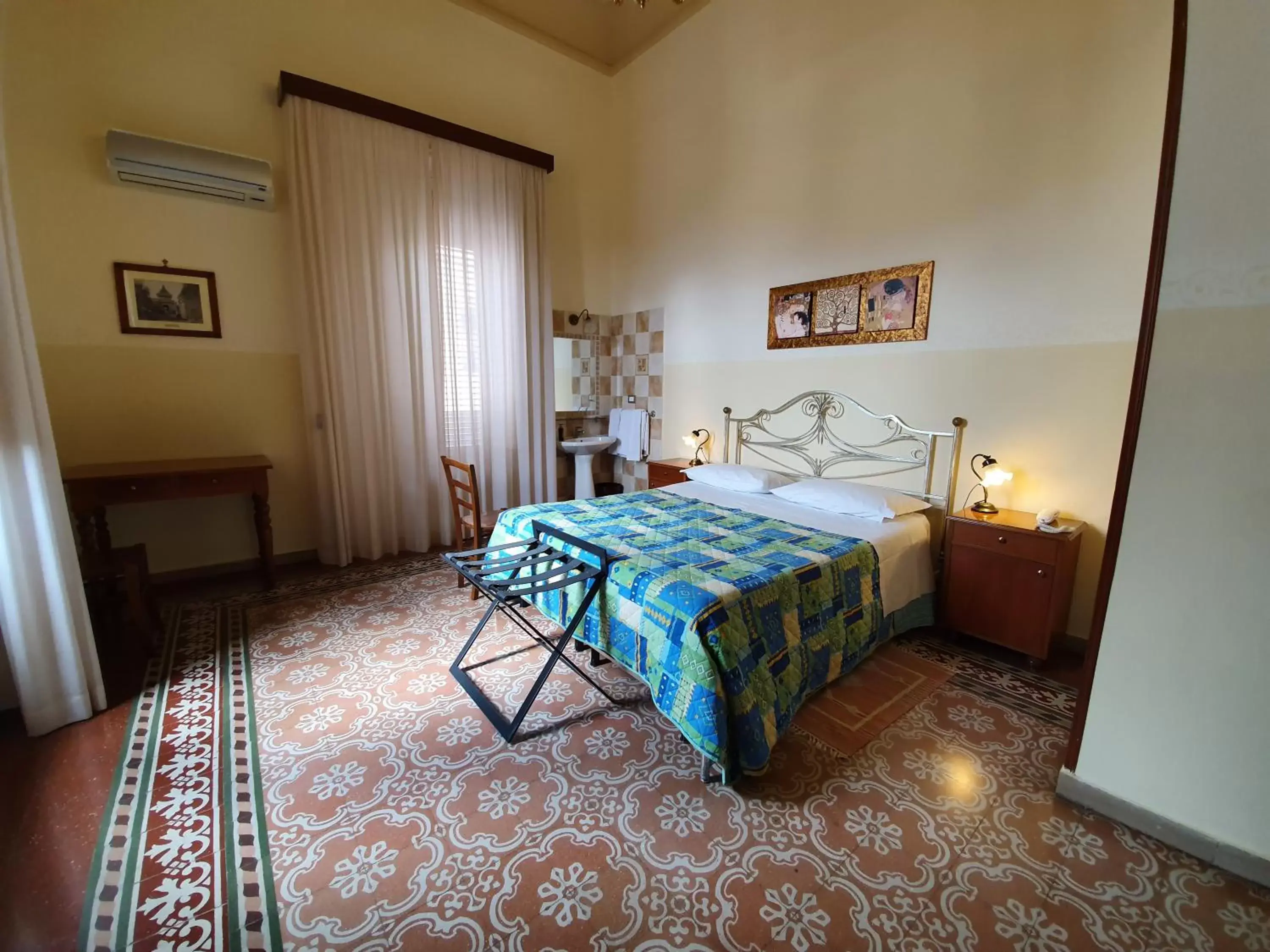 Bed in Albergo Cavour