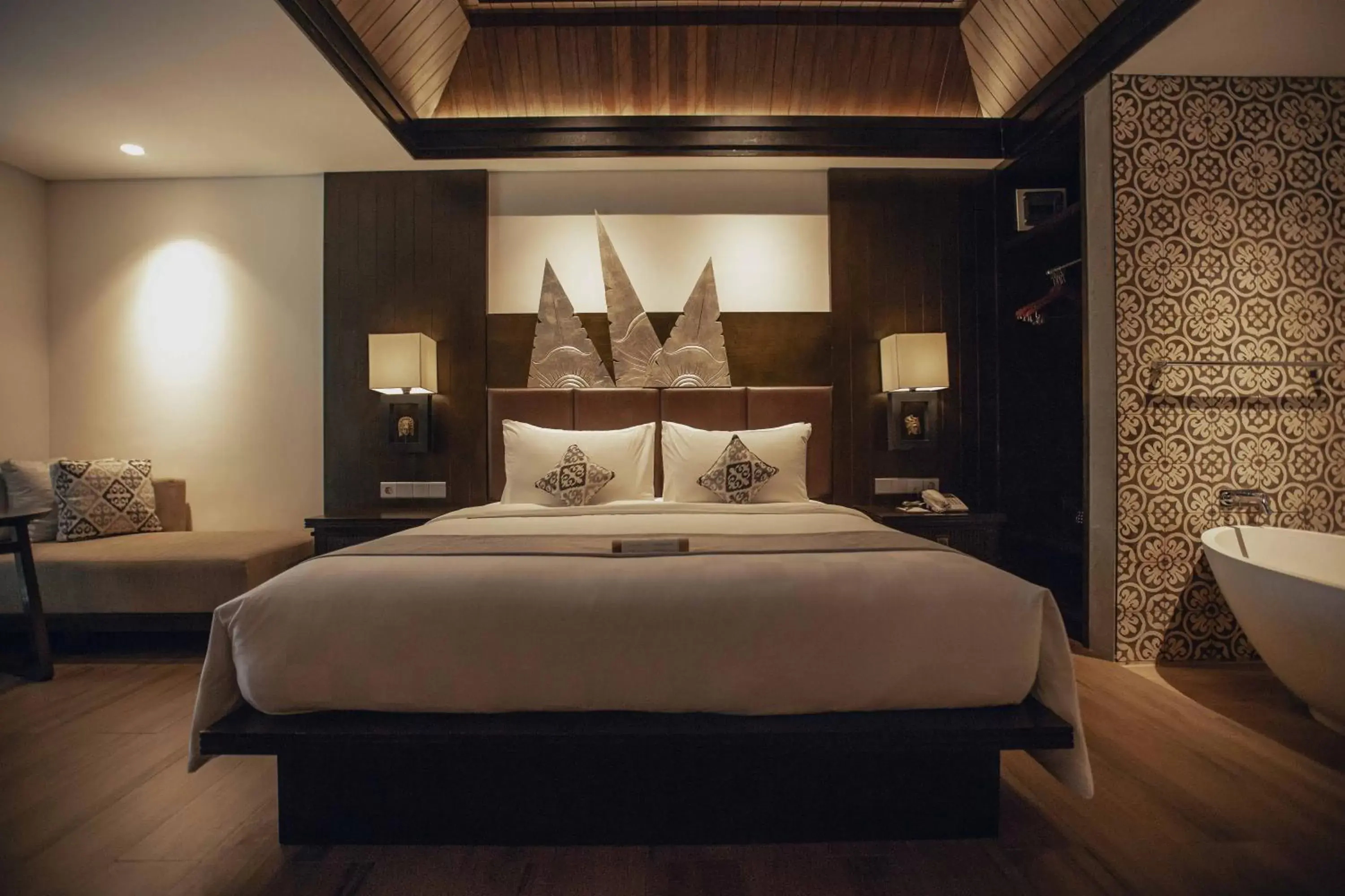 Bed in The Vira Bali Boutique Hotel & Suite