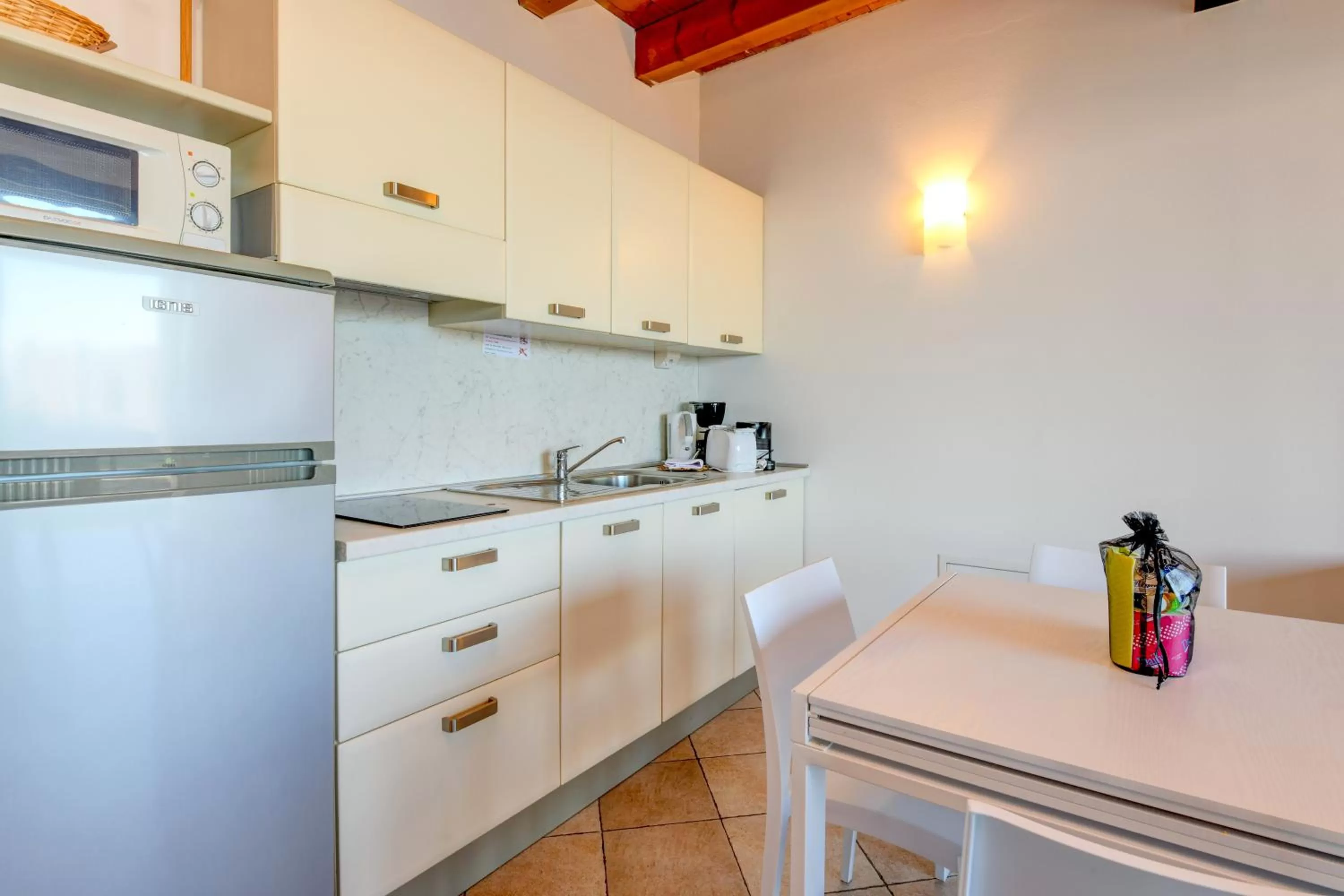 Kitchen or kitchenette in Relais Rosa Dei Venti -Ciao Vacanze-