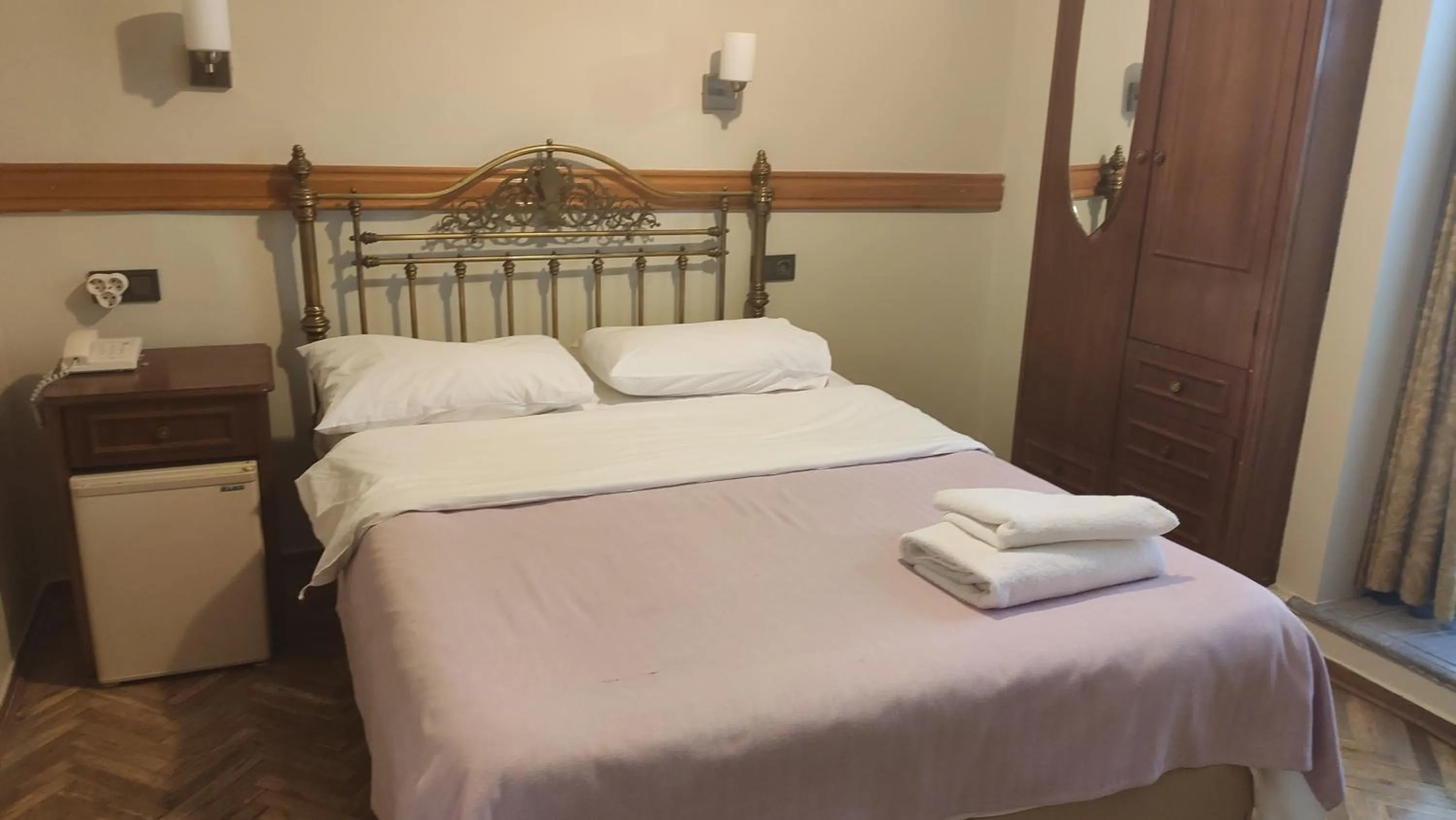 Bed in Turkoman Hotel