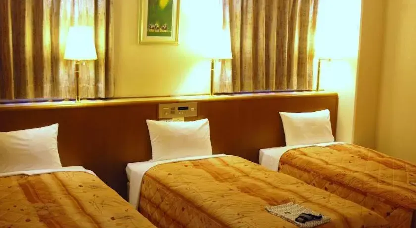 Bed in Business Hotel Nissei