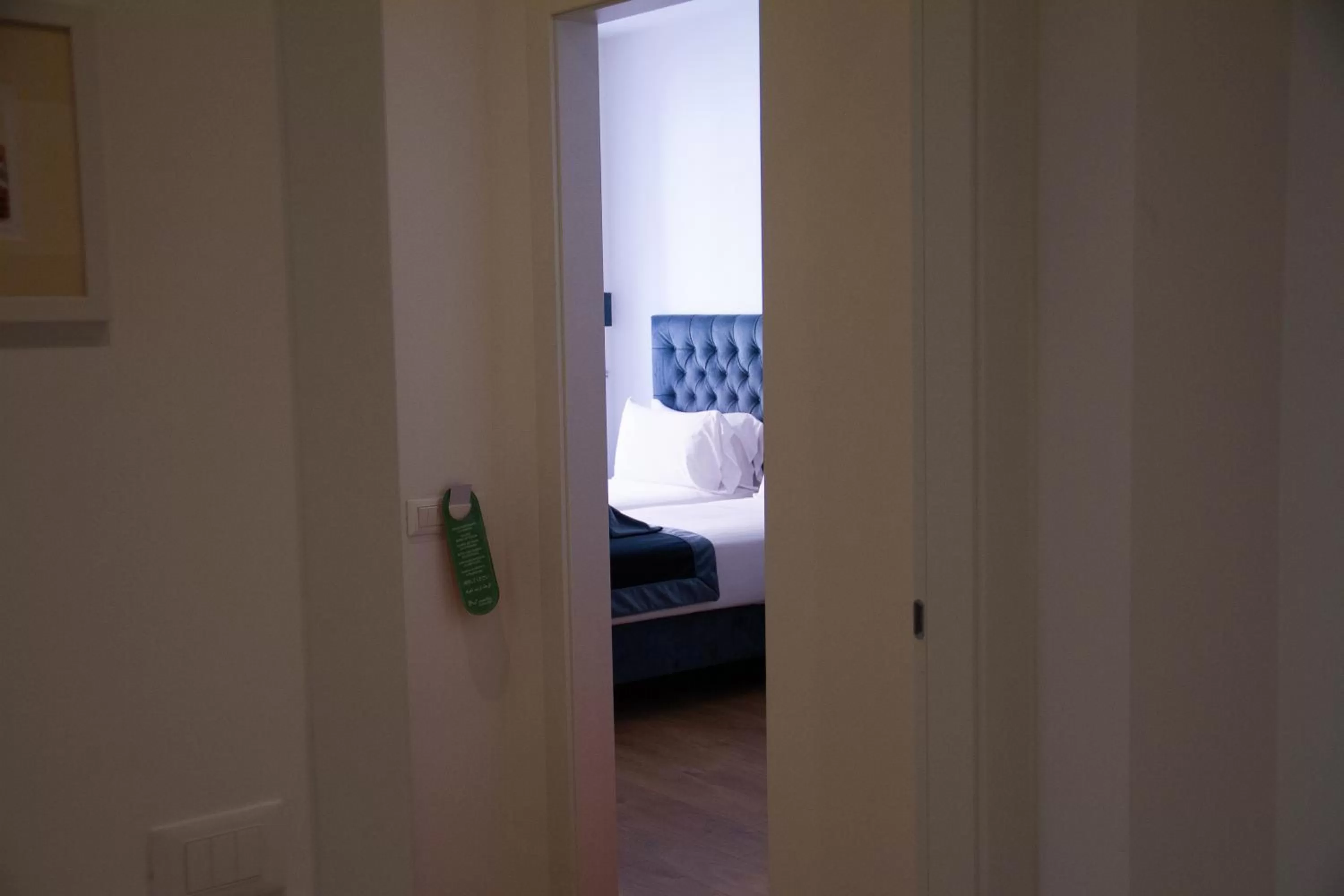 Bed in Michelangelo Vatican Rooms