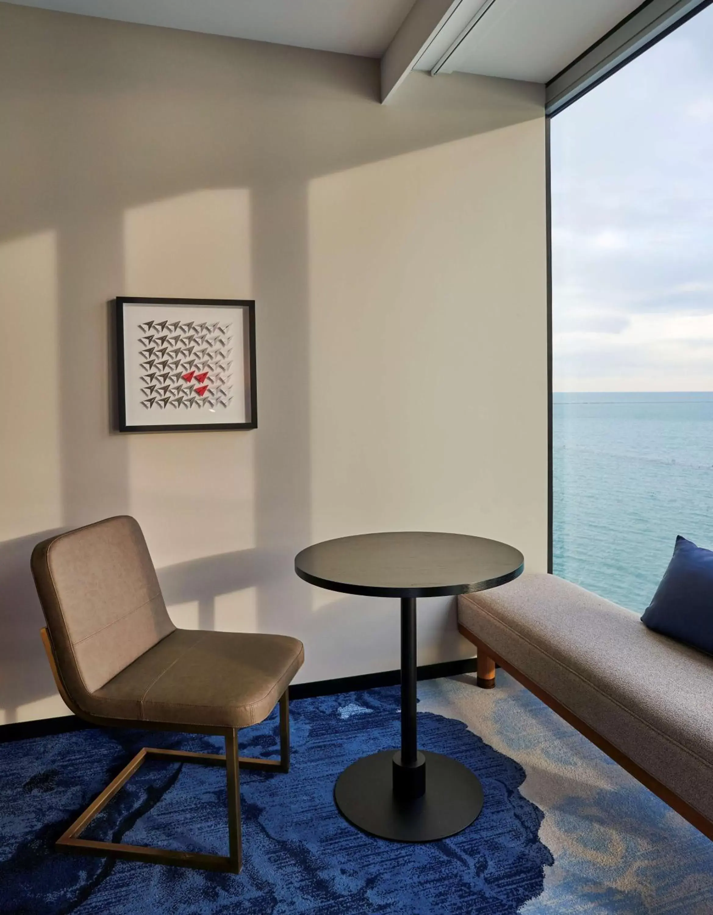 Living room, Seating Area in Sable At Navy Pier Chicago, Curio Collection By Hilton