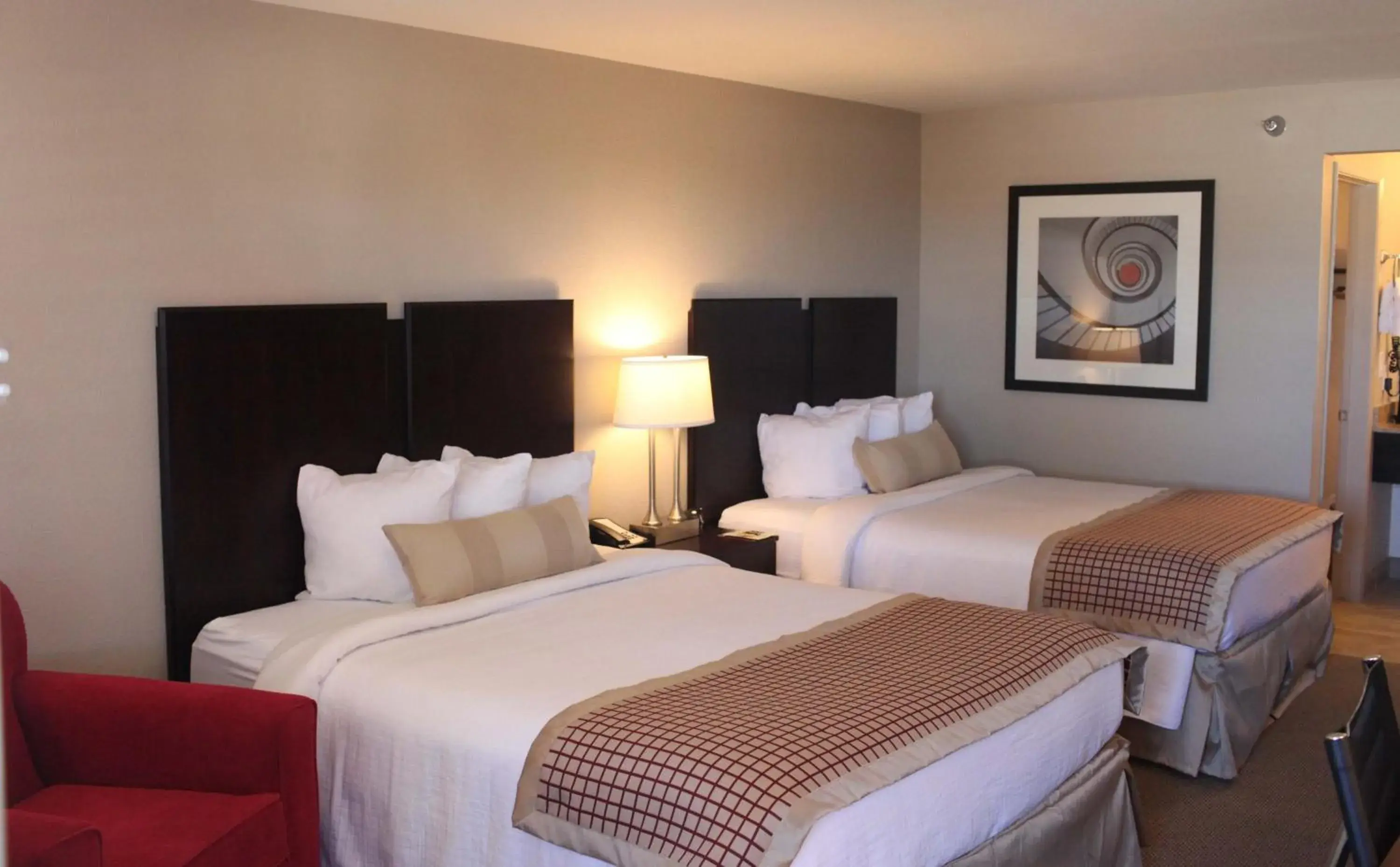 Bed in Ramada by Wyndham Tempe/At Arizona Mills Mall