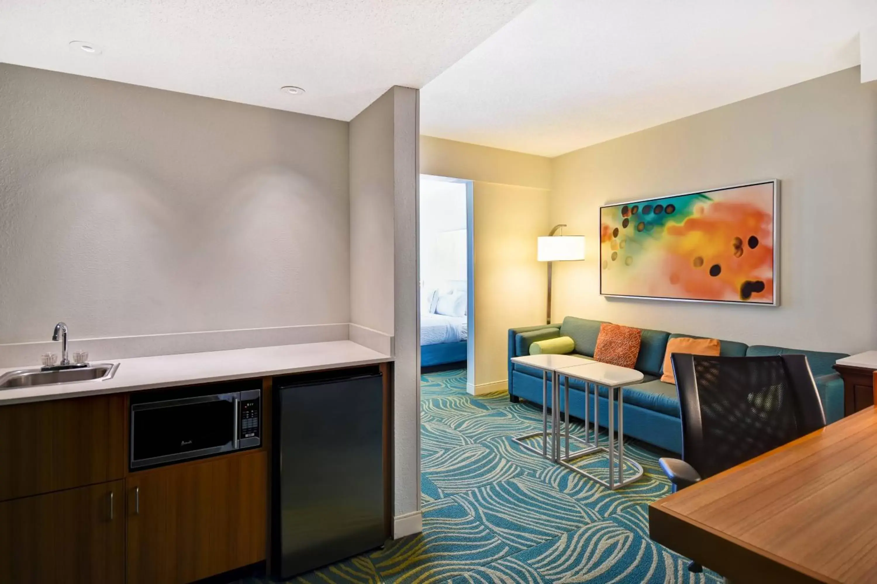 Bedroom, Kitchen/Kitchenette in SpringHill Suites by Marriott Baltimore BWI Airport