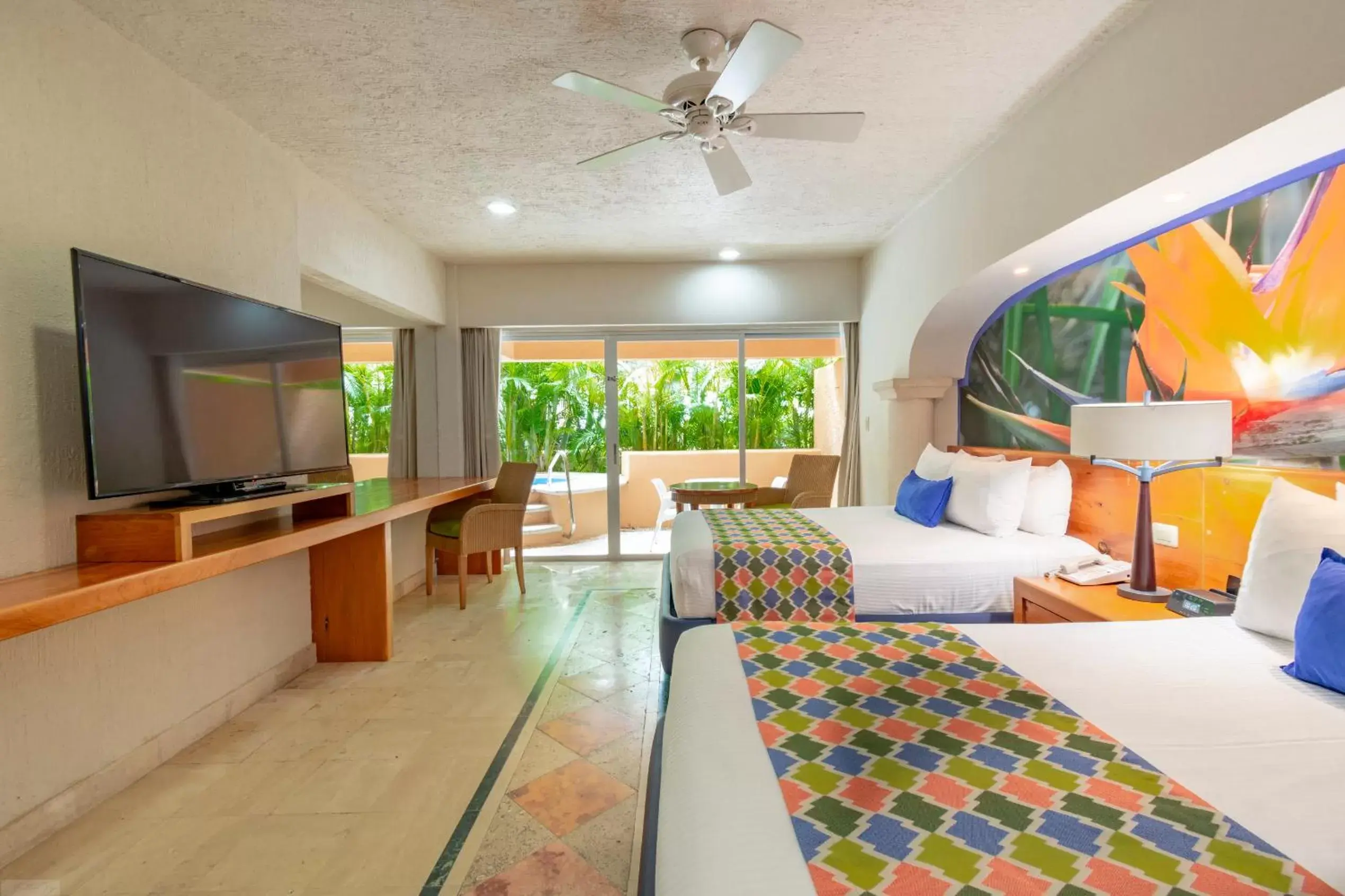 Photo of the whole room, TV/Entertainment Center in Puerto Aventuras Hotel & Beach Club