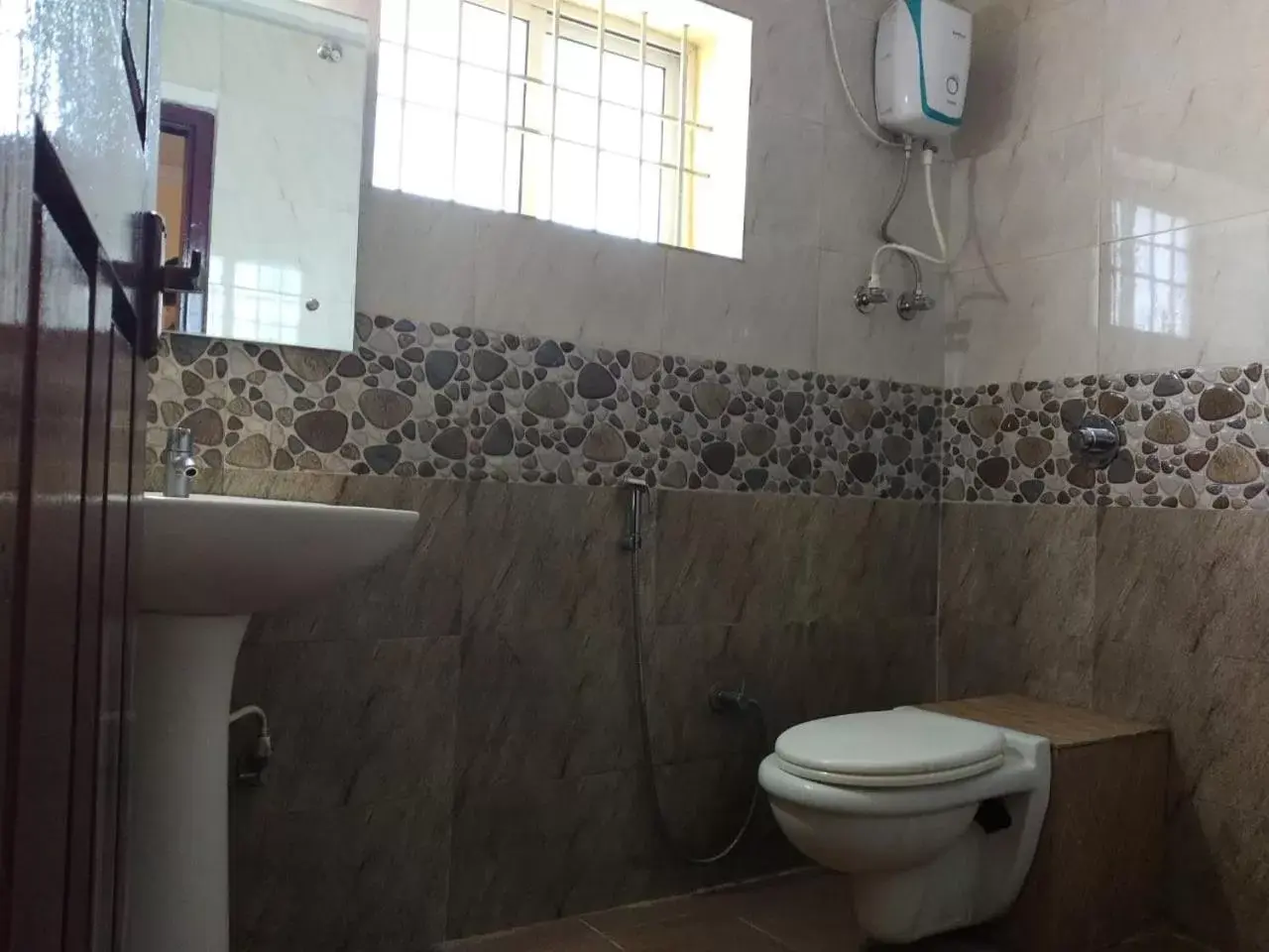 Bathroom in STAYMAKER Srinivasa Residency