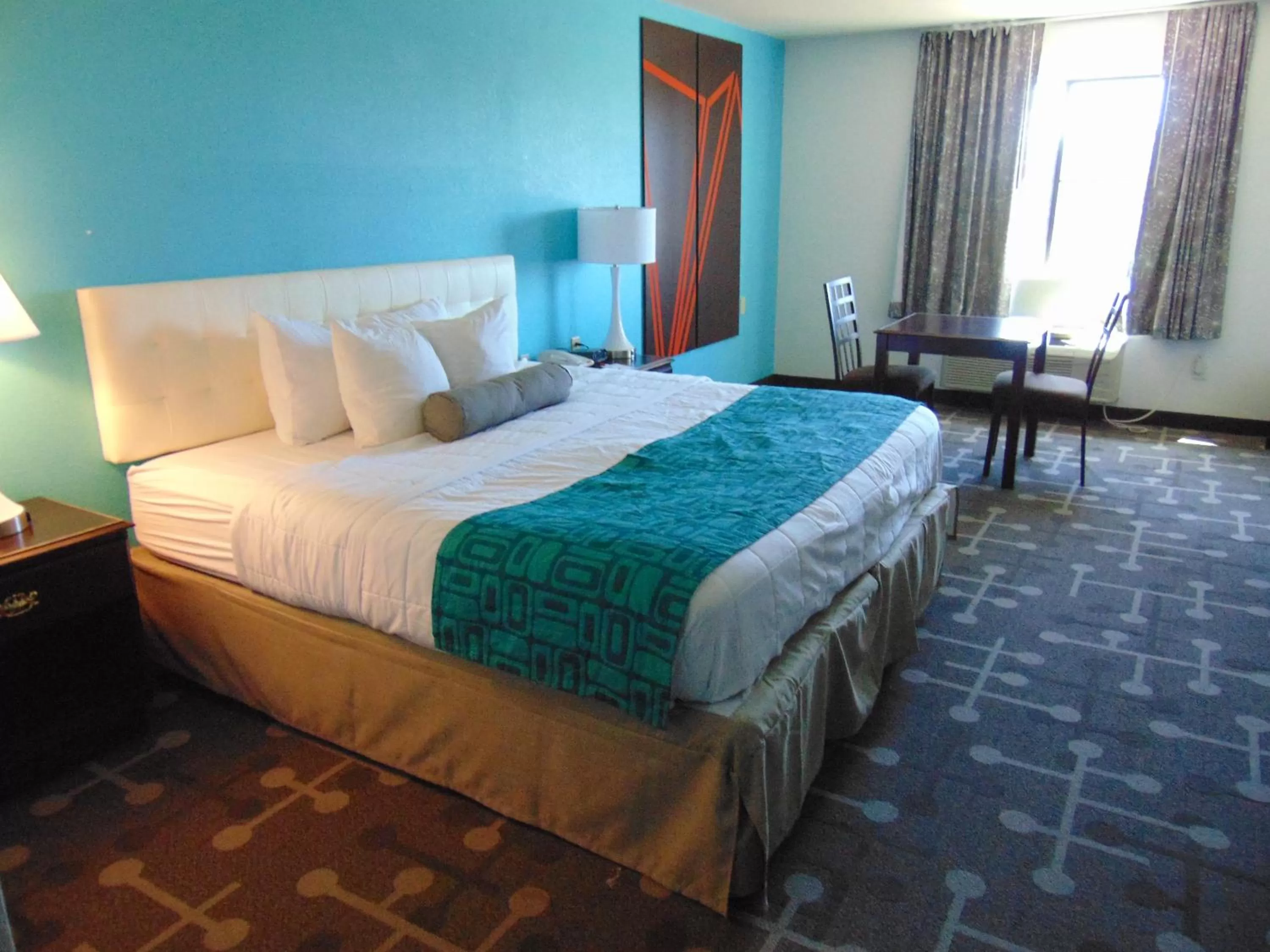 Bed in Howard Johnson by Wyndham Lubbock TX