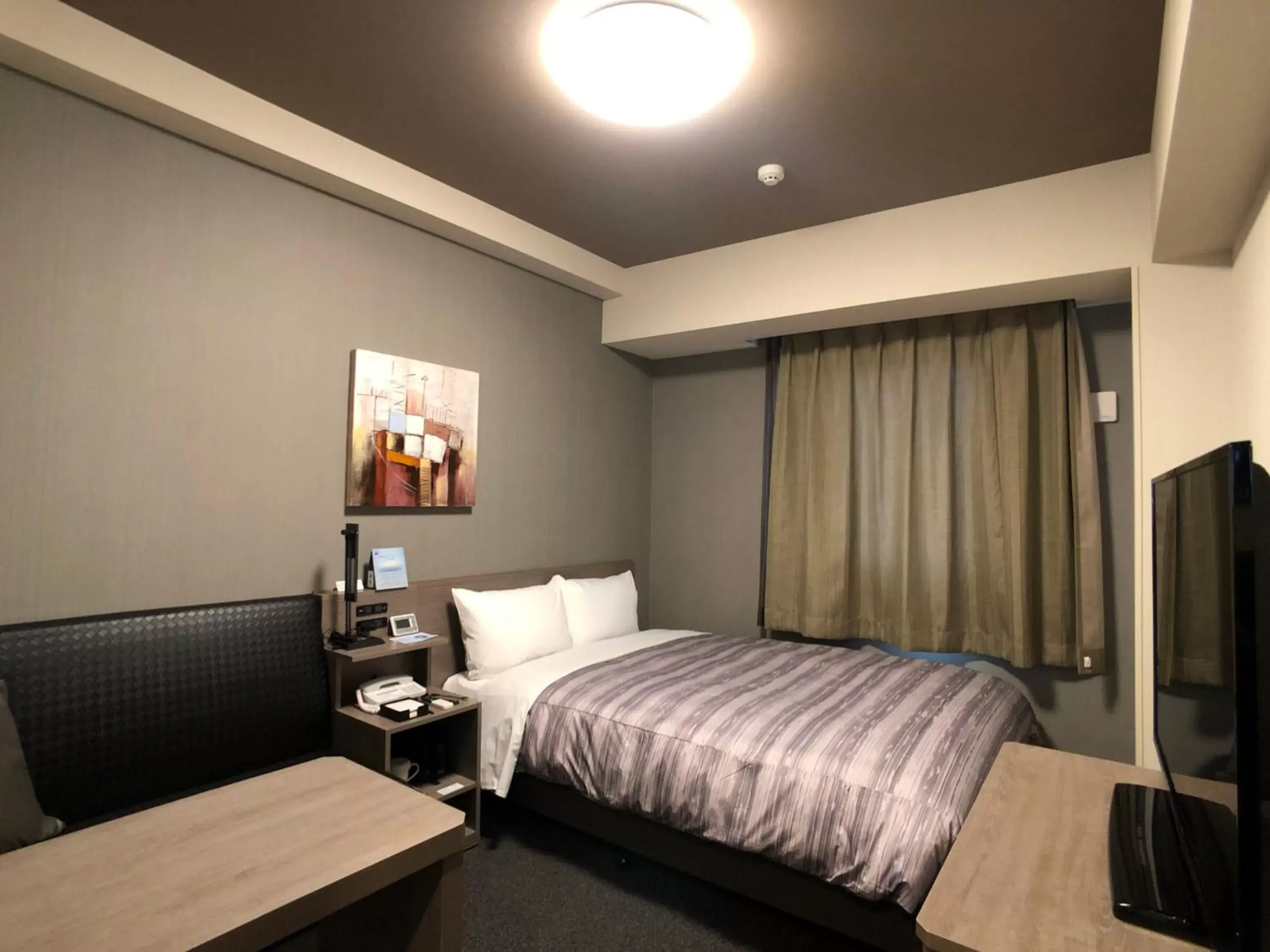 Bed in Hotel Route-Inn Koga Ekimae