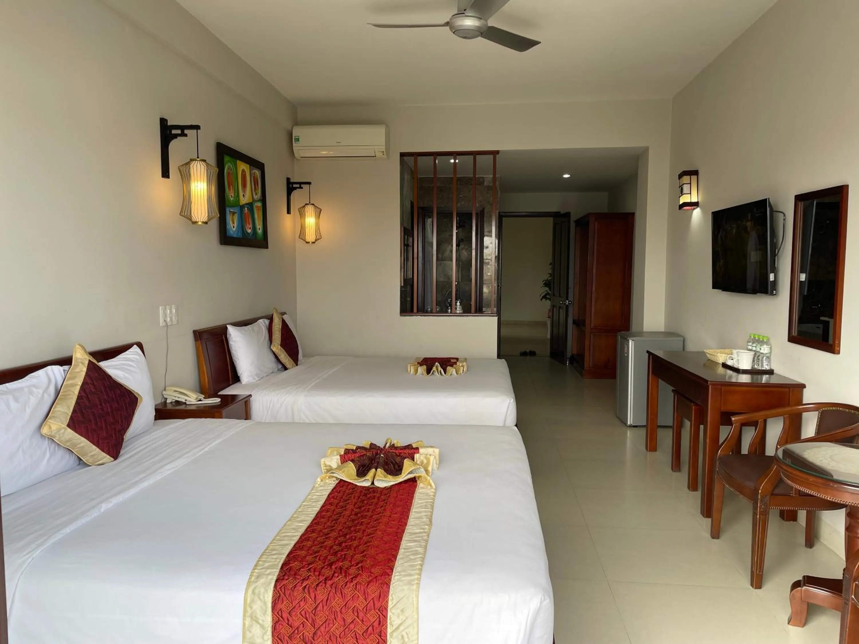 Bed in Sunshine Hoian Hotel