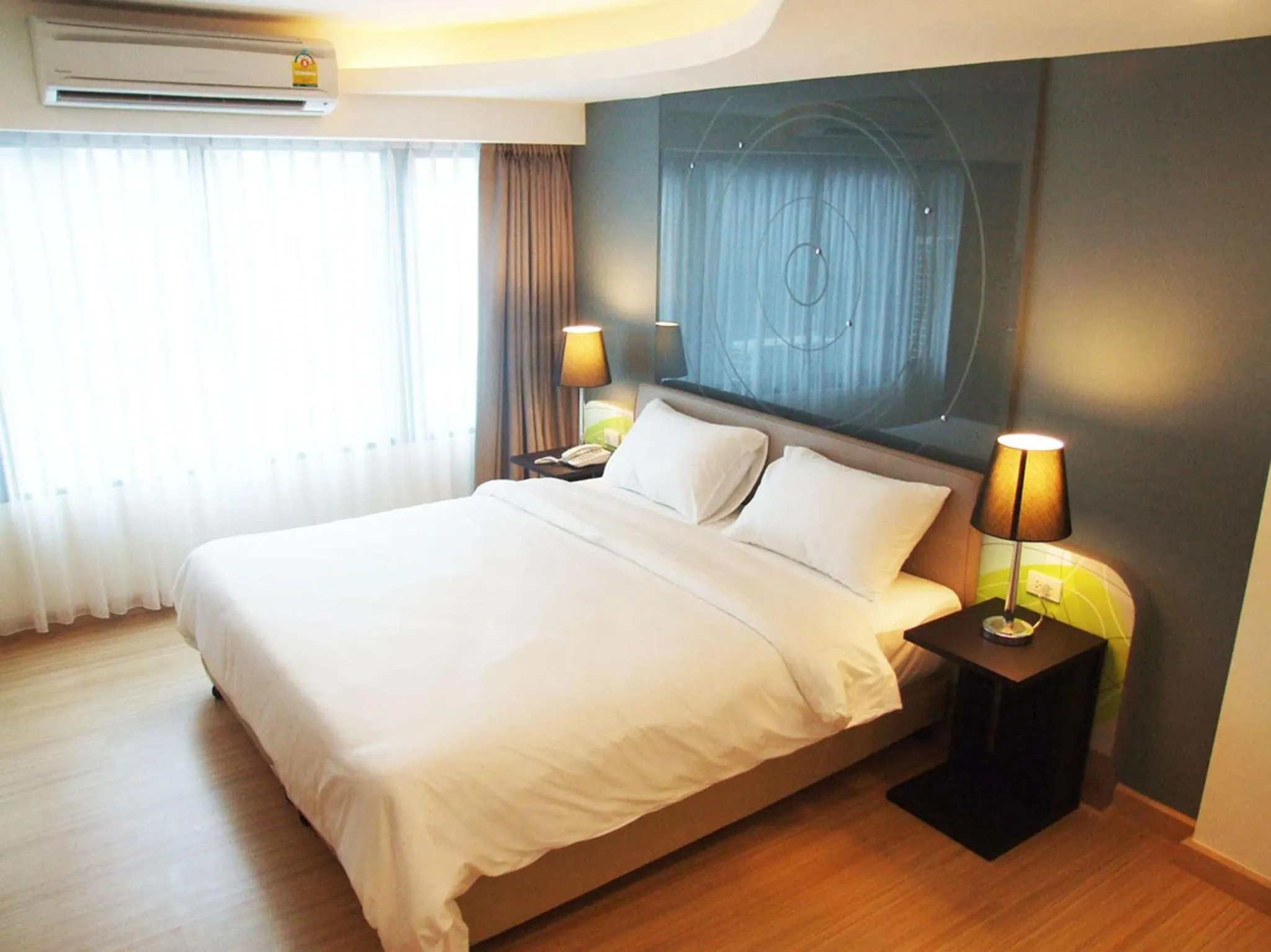Bed in Grand Tower Inn Sathorn Hotel