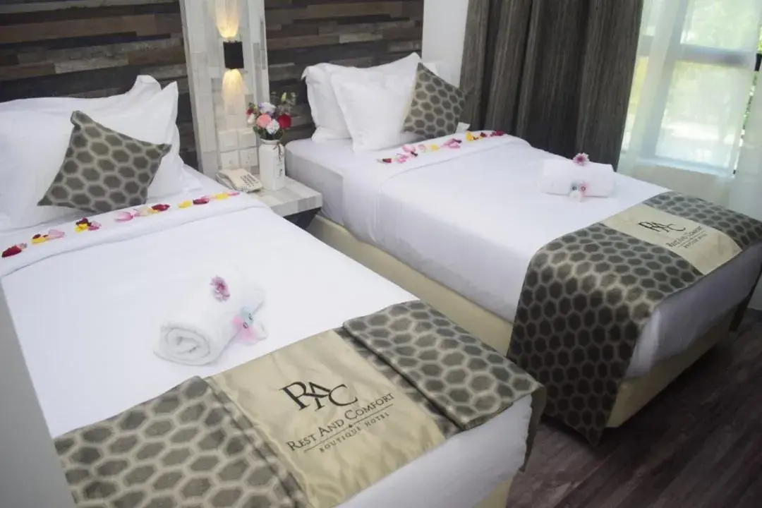 Bed in Rest And Comfort Boutique Hotel