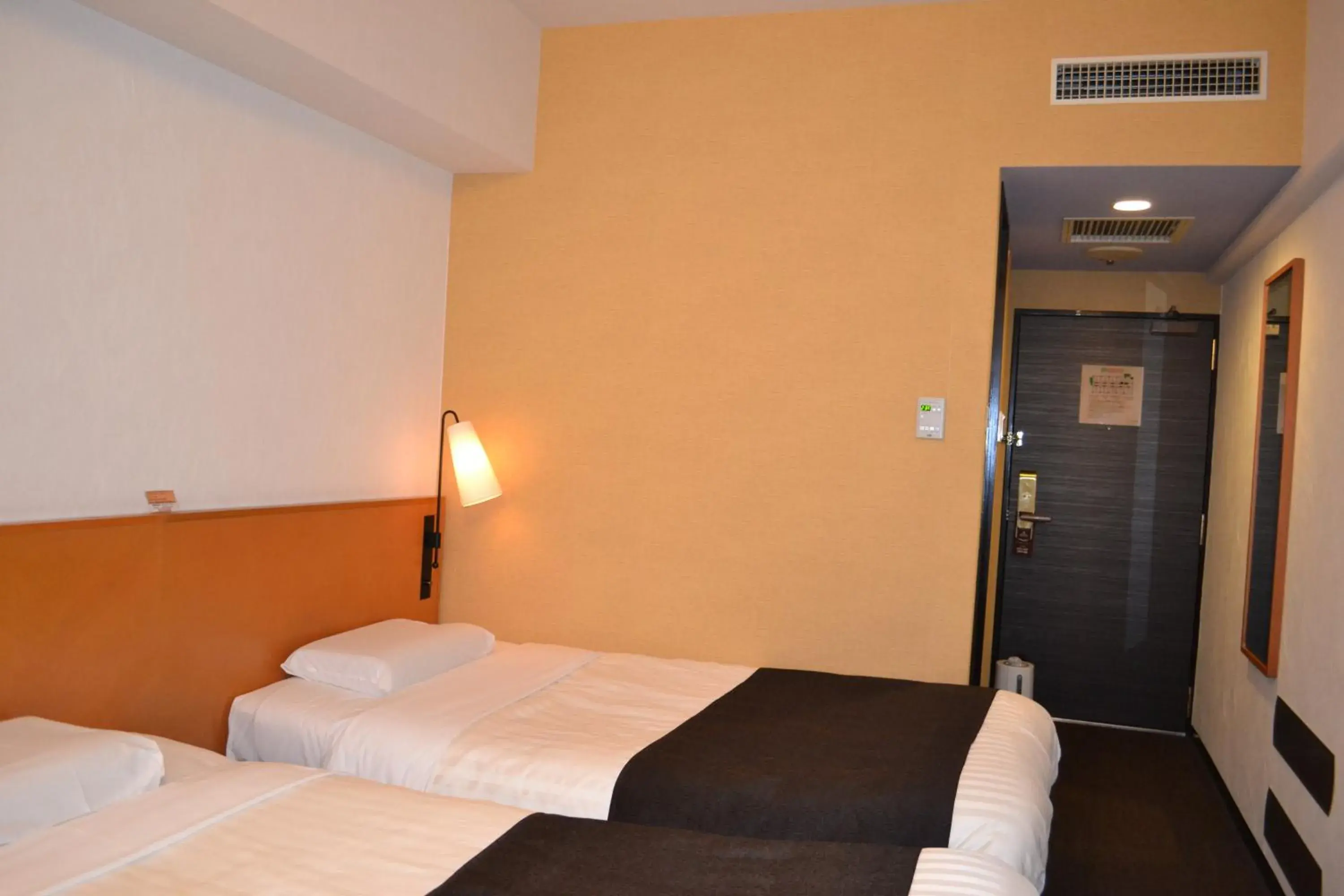 Bed in Hotel Listel Shinjuku