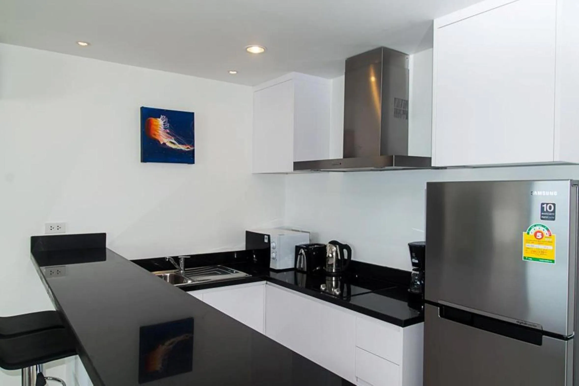 Kitchen or kitchenette in Tropical Sea View Residence