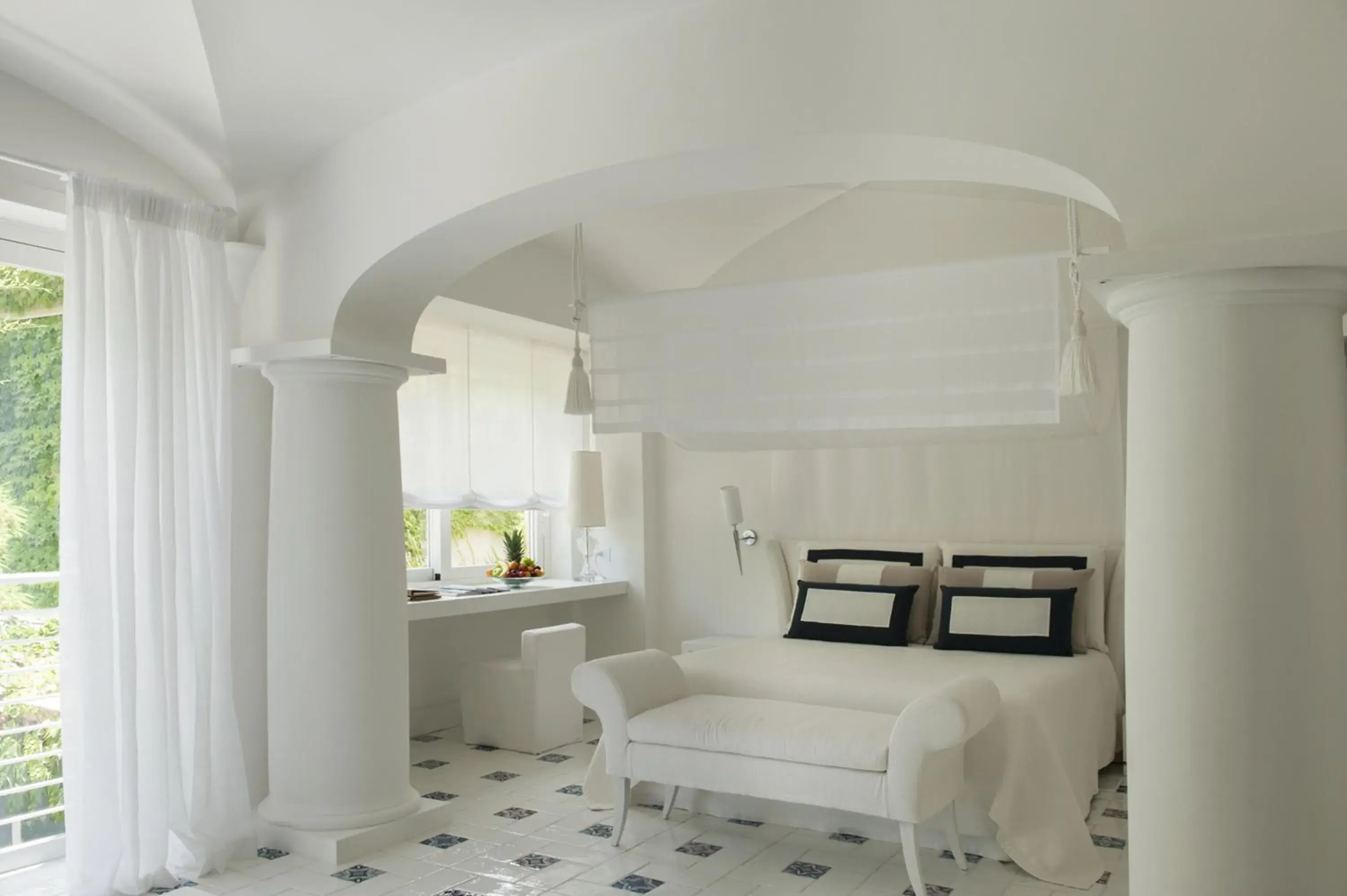 Bed, Seating Area in Capri Palace Jumeirah