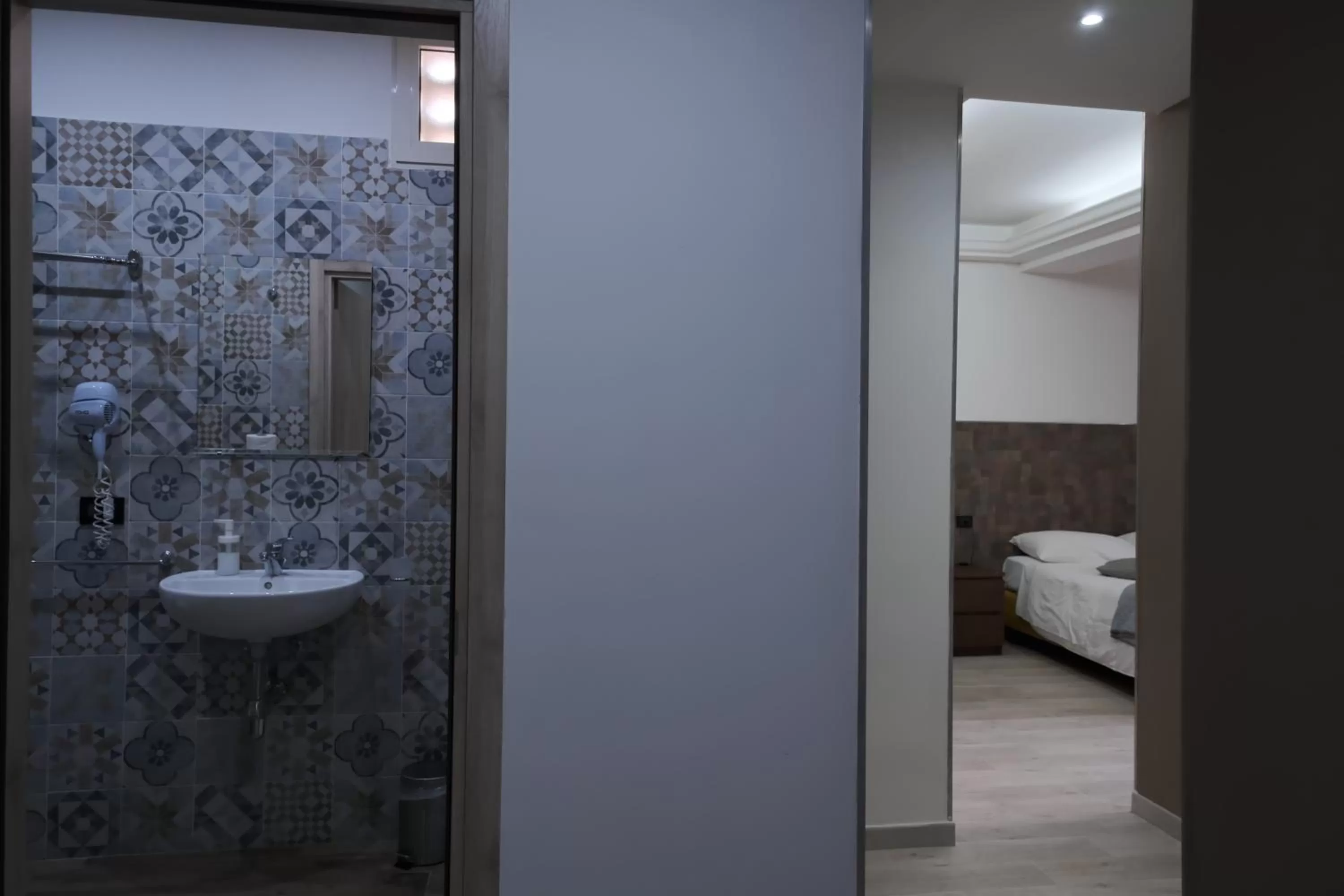 Toilet, Bed in Royalty Rooms & Spa