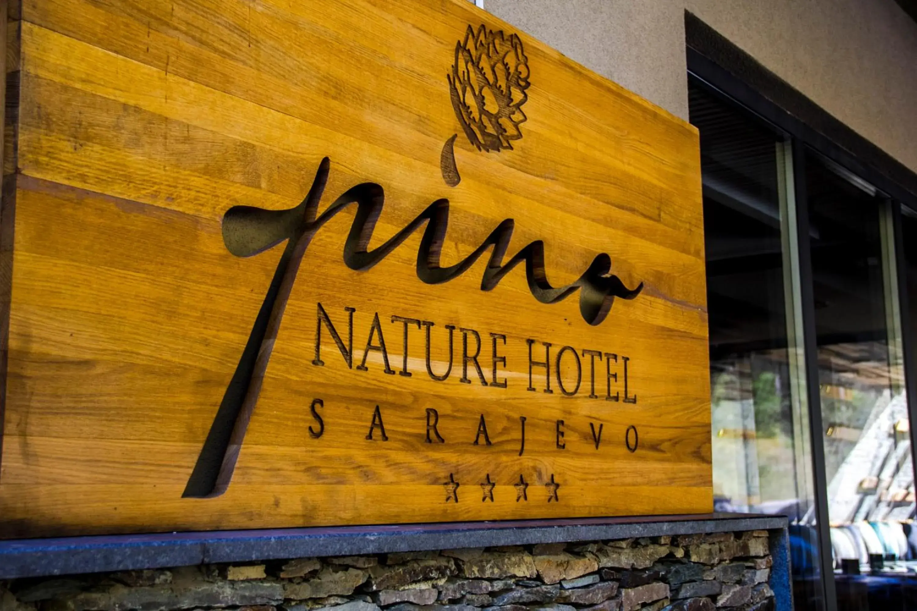 Property logo or sign in Pino Nature Hotel