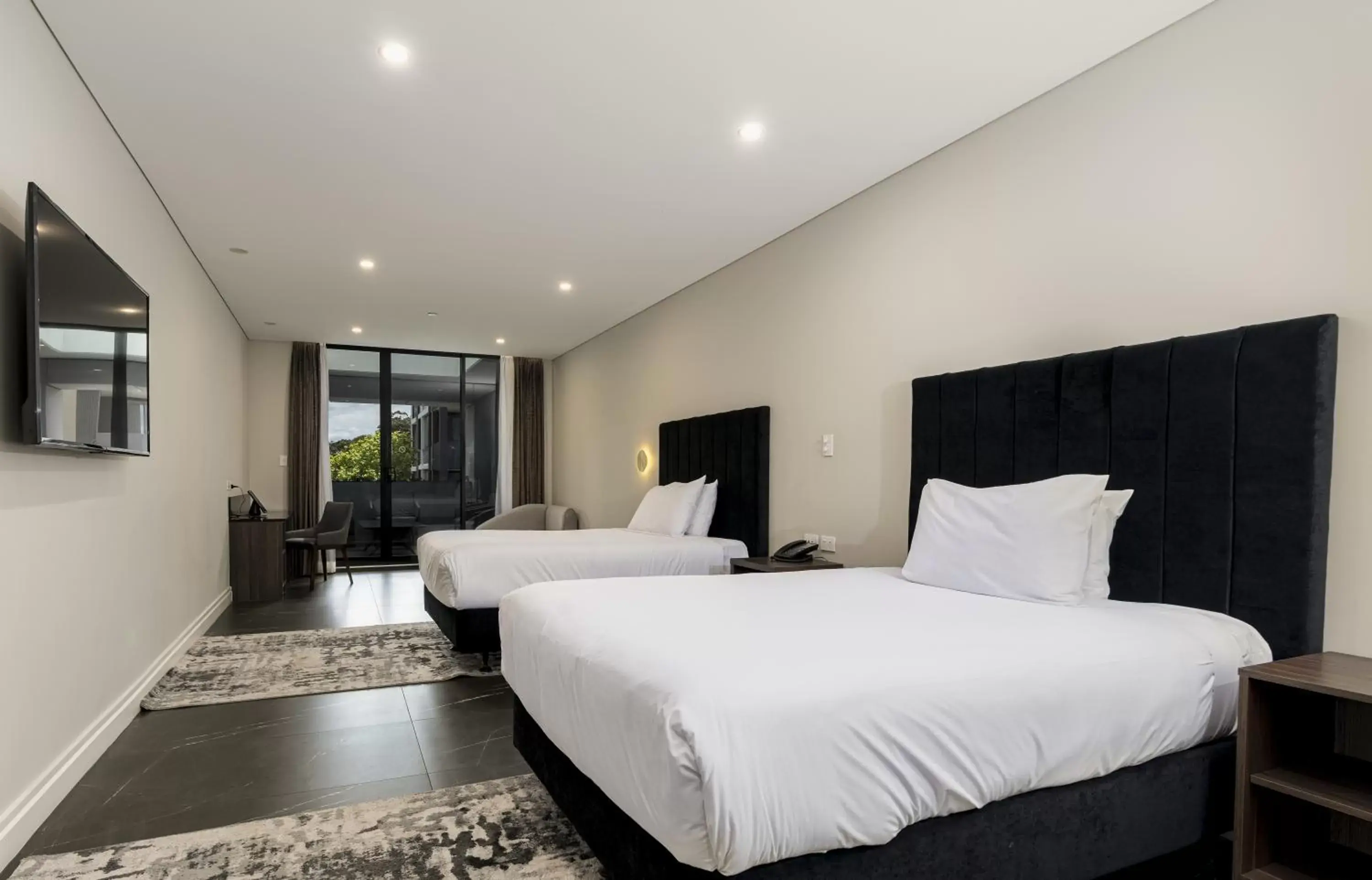 Bed in Crowne Plaza Sydney Burwood, an IHG Hotel