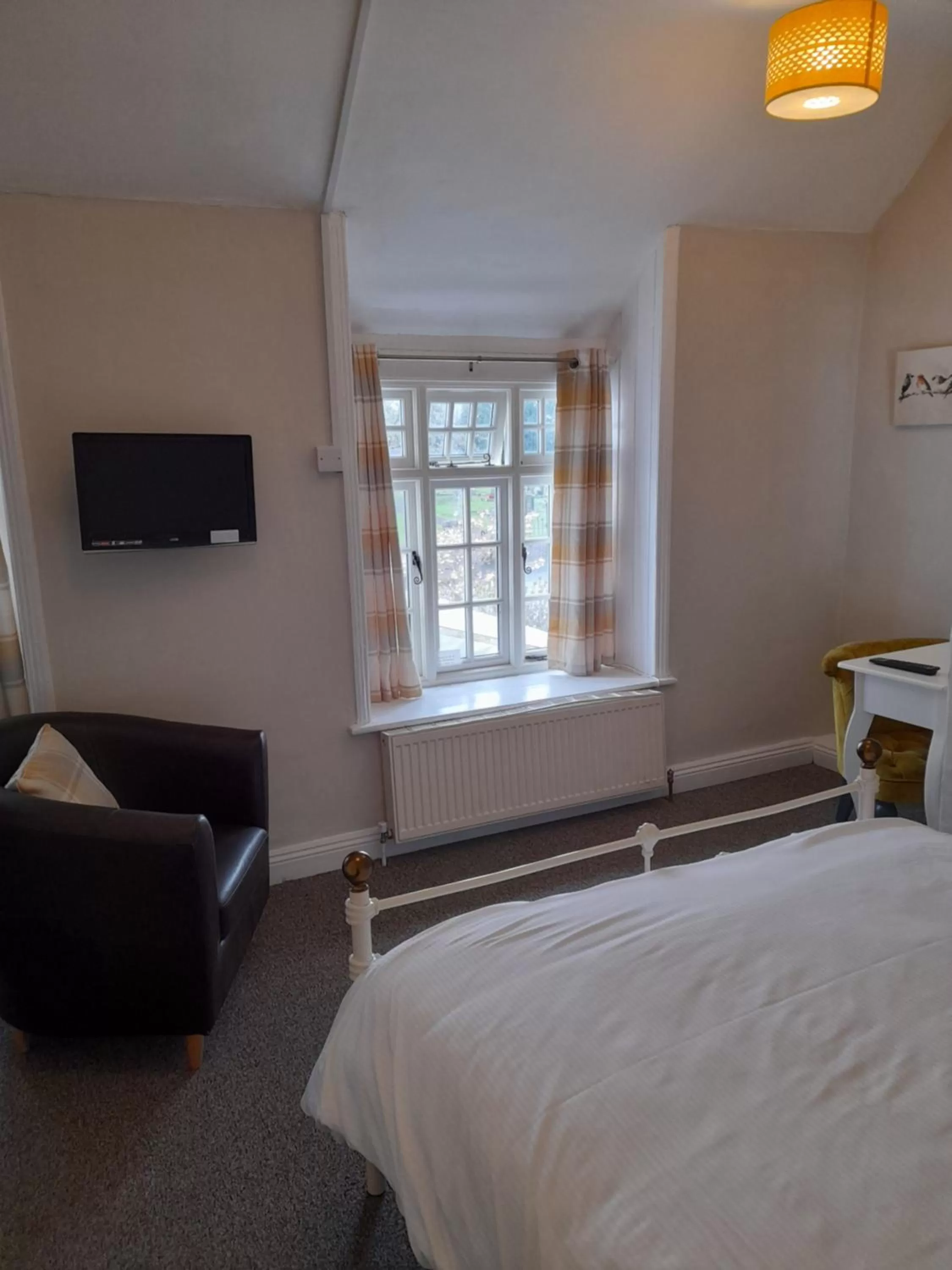 Bed in The Raven Inn