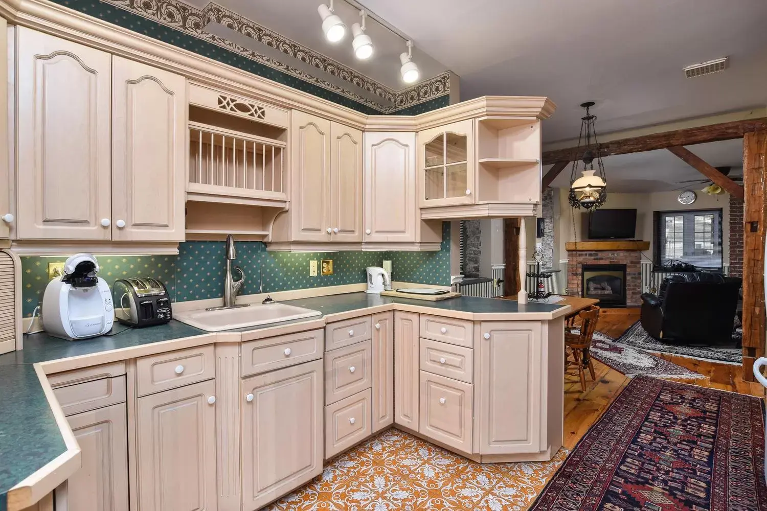 Kitchen/Kitchenette in The Noble Waterfront Apartment Suites