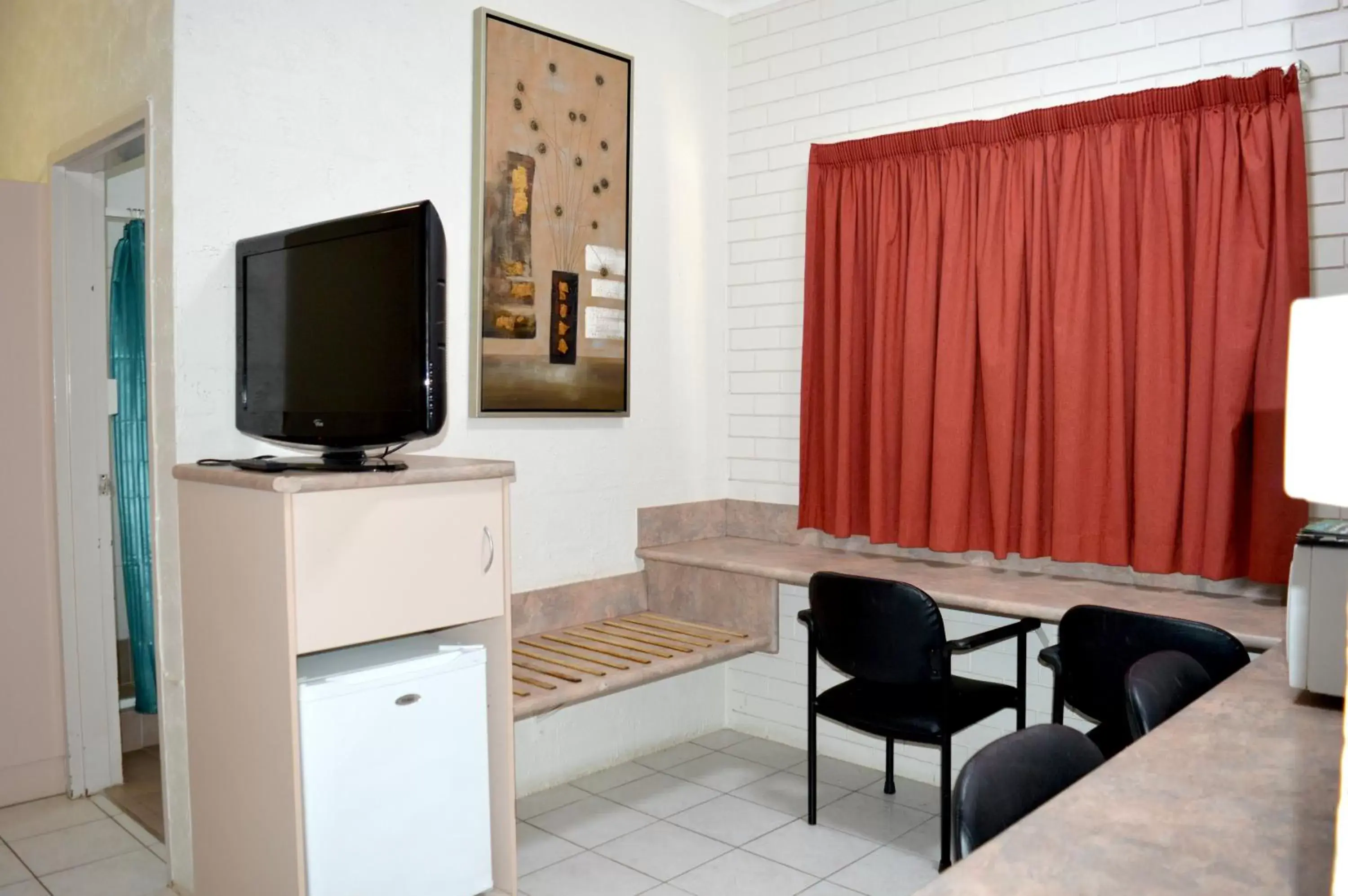 TV and multimedia, TV/Entertainment Center in Mid City Motor Inn