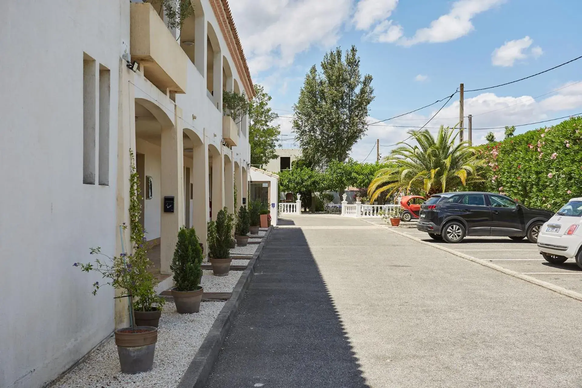 Parking, Property Building in Hotel Le Rodin