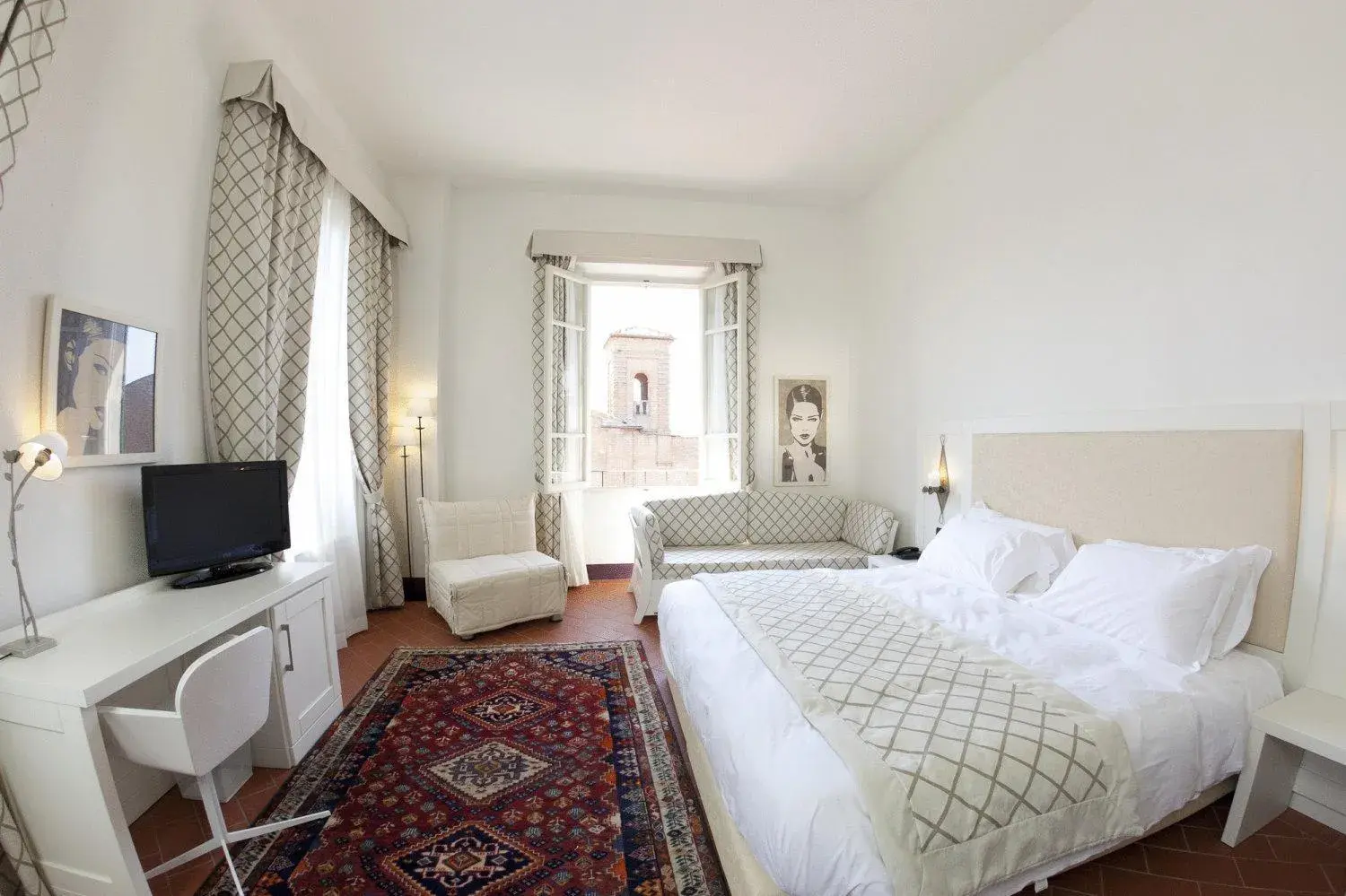 Bed, TV/Entertainment Center in Hotel San Miniato