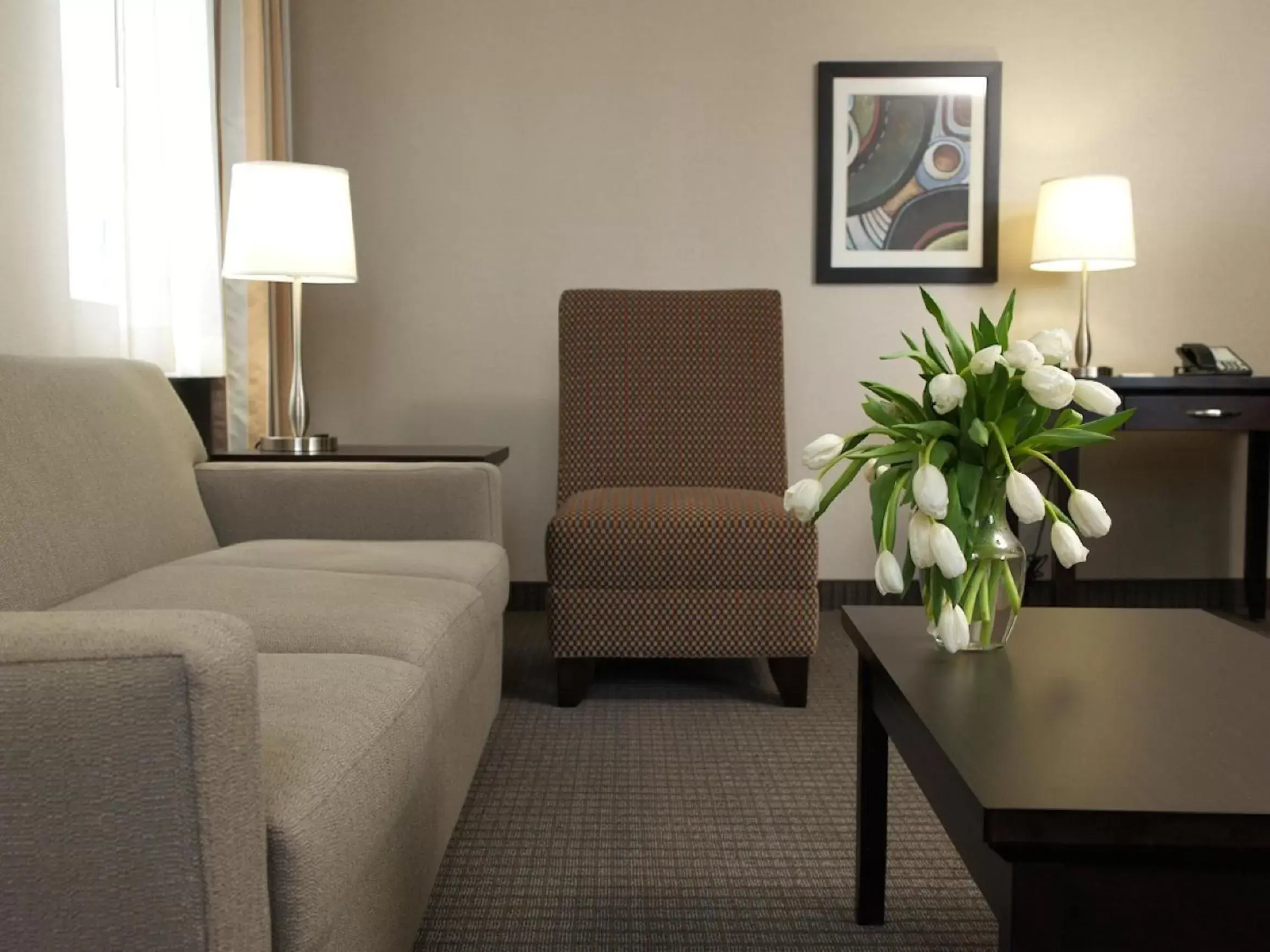 Living room, Seating Area in Coast Calgary Downtown Hotel & Suites by APA