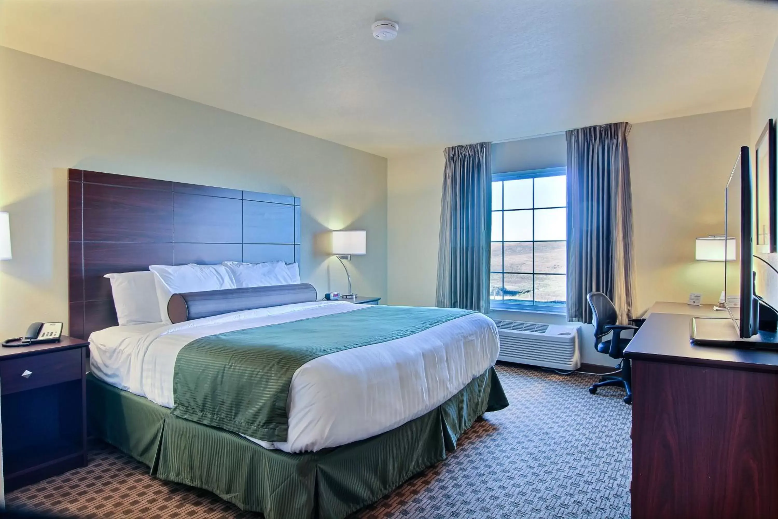 Bed in Cobblestone Hotel & Suites - McCook