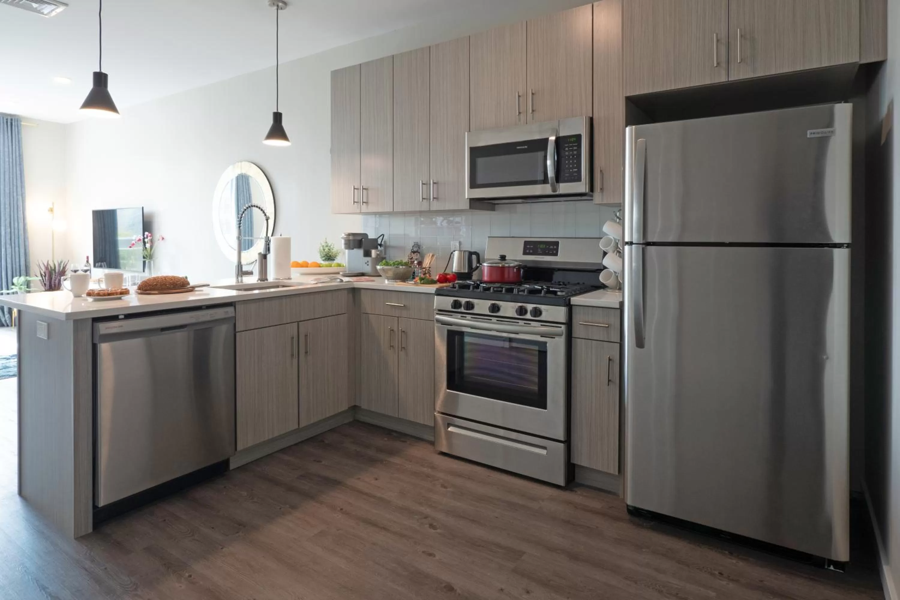 Kitchen or kitchenette in Luxury Furnished Apartments by Hyatus Downtown at Yale