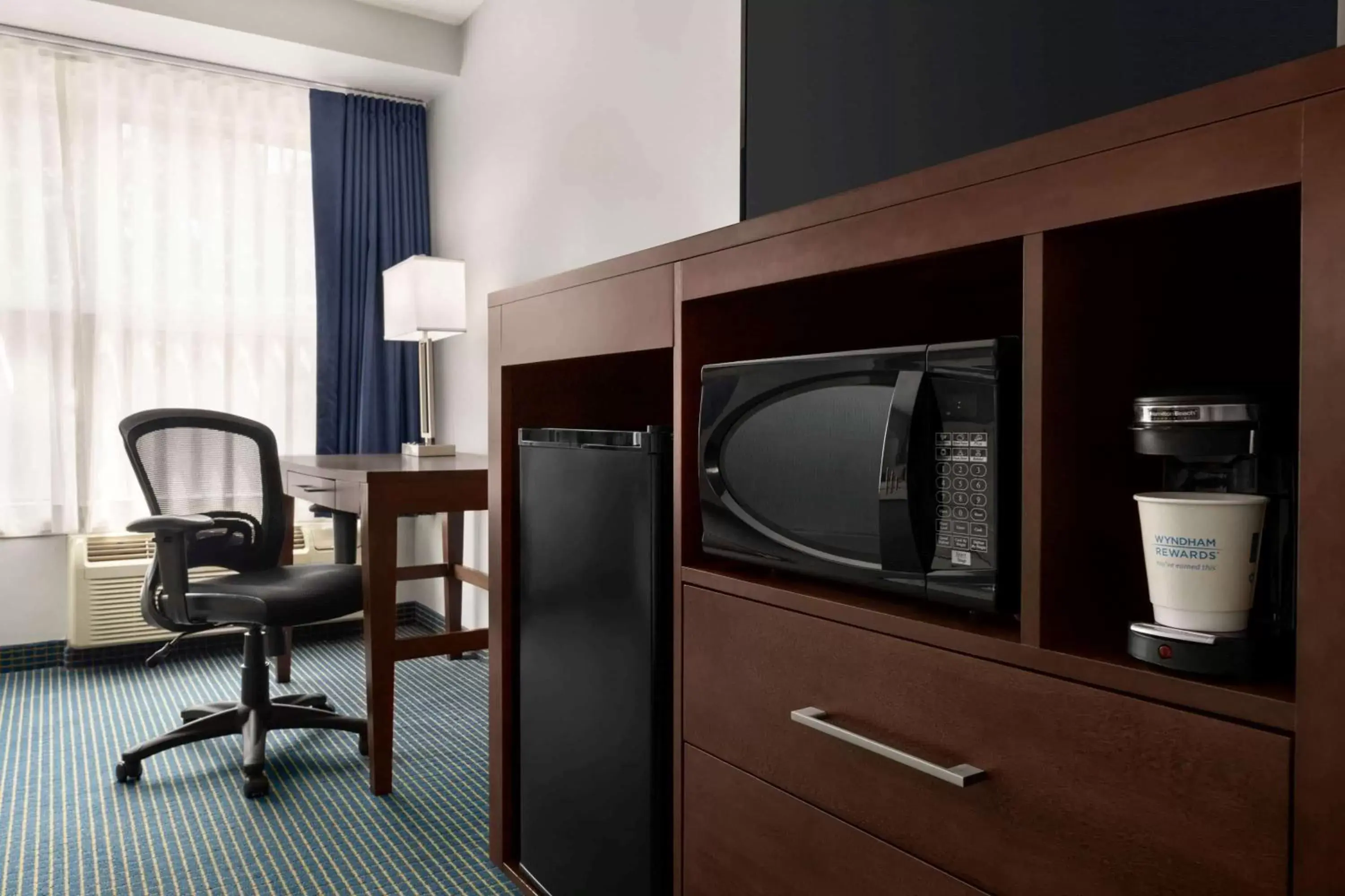 Photo of the whole room, TV/Entertainment Center in Days Inn by Wyndham Sarnia Harbourfront