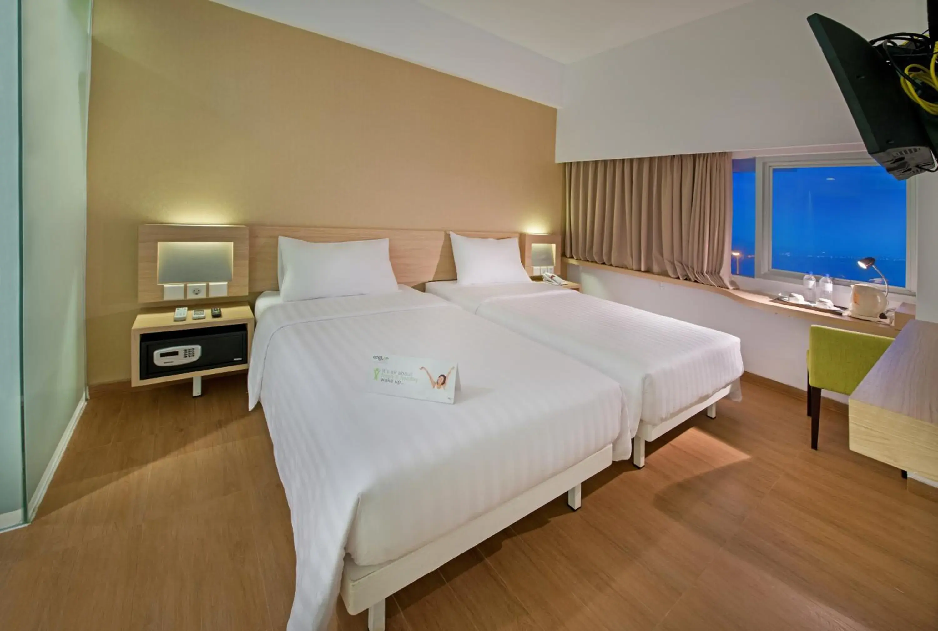 Bed in Whiz Prime Hotel Megamas Manado Bed in Whiz Prime Hotel Megamas Manado