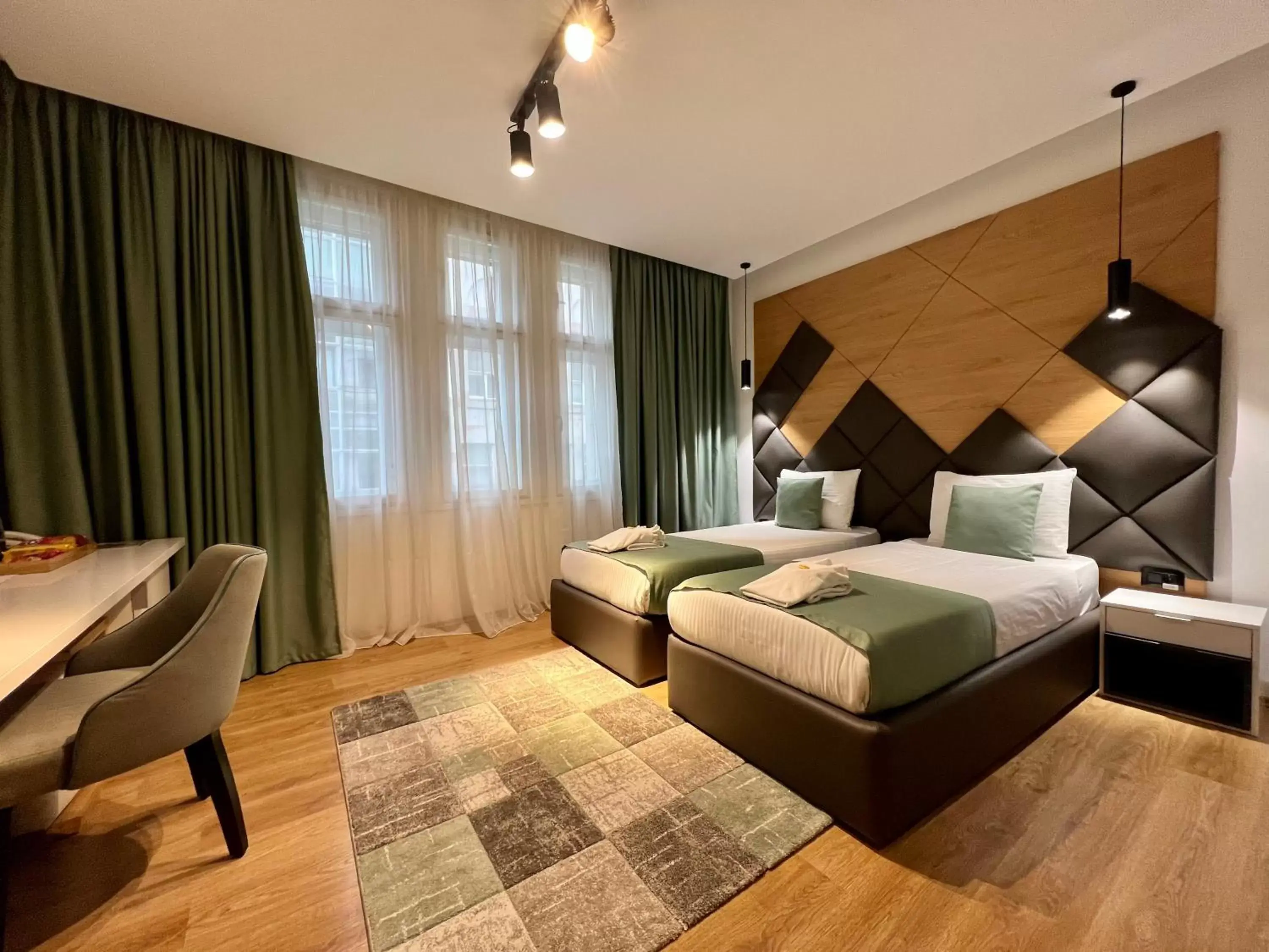 Bed in Capital Hotel Garni