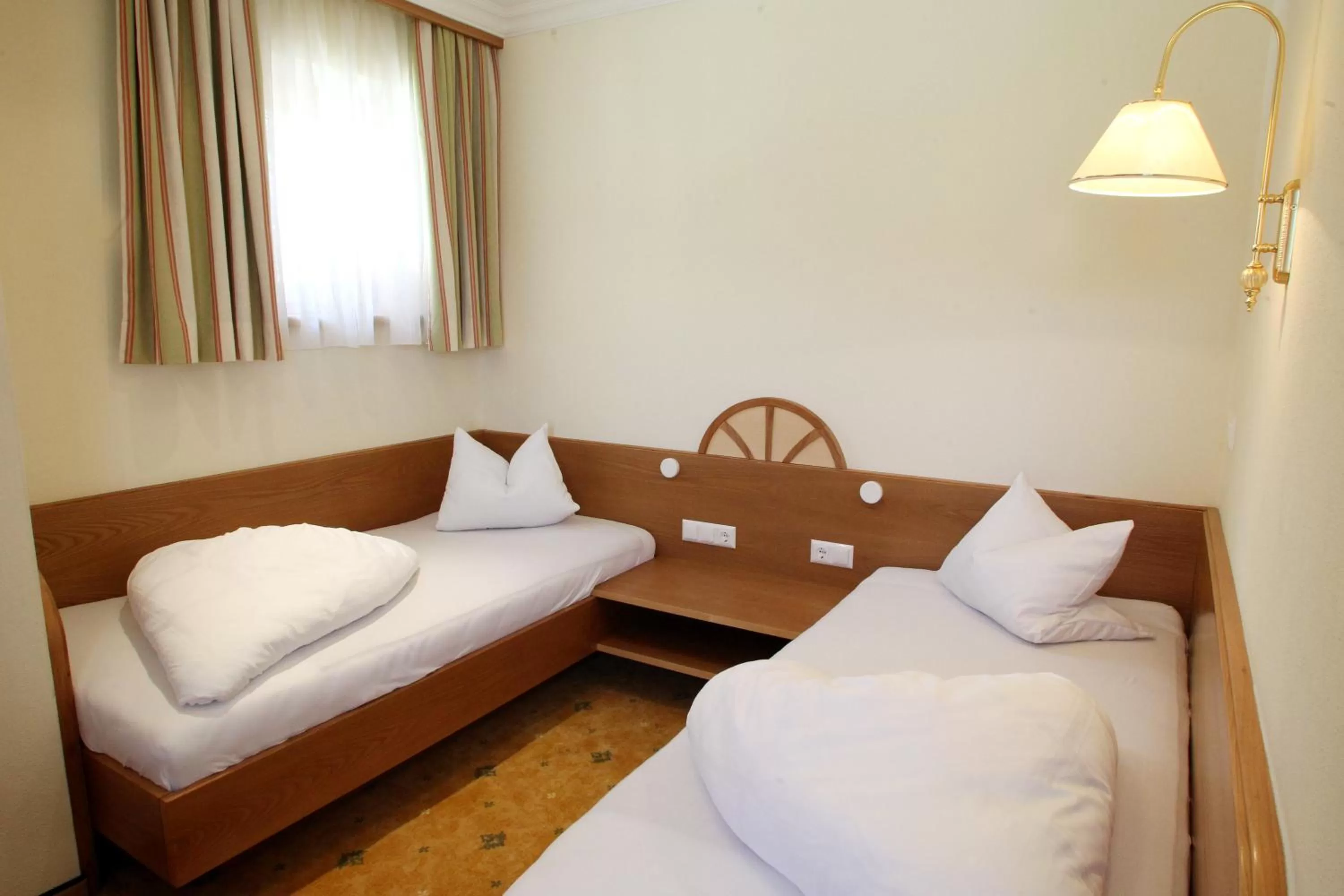 Bed in Hotel Neuwirt