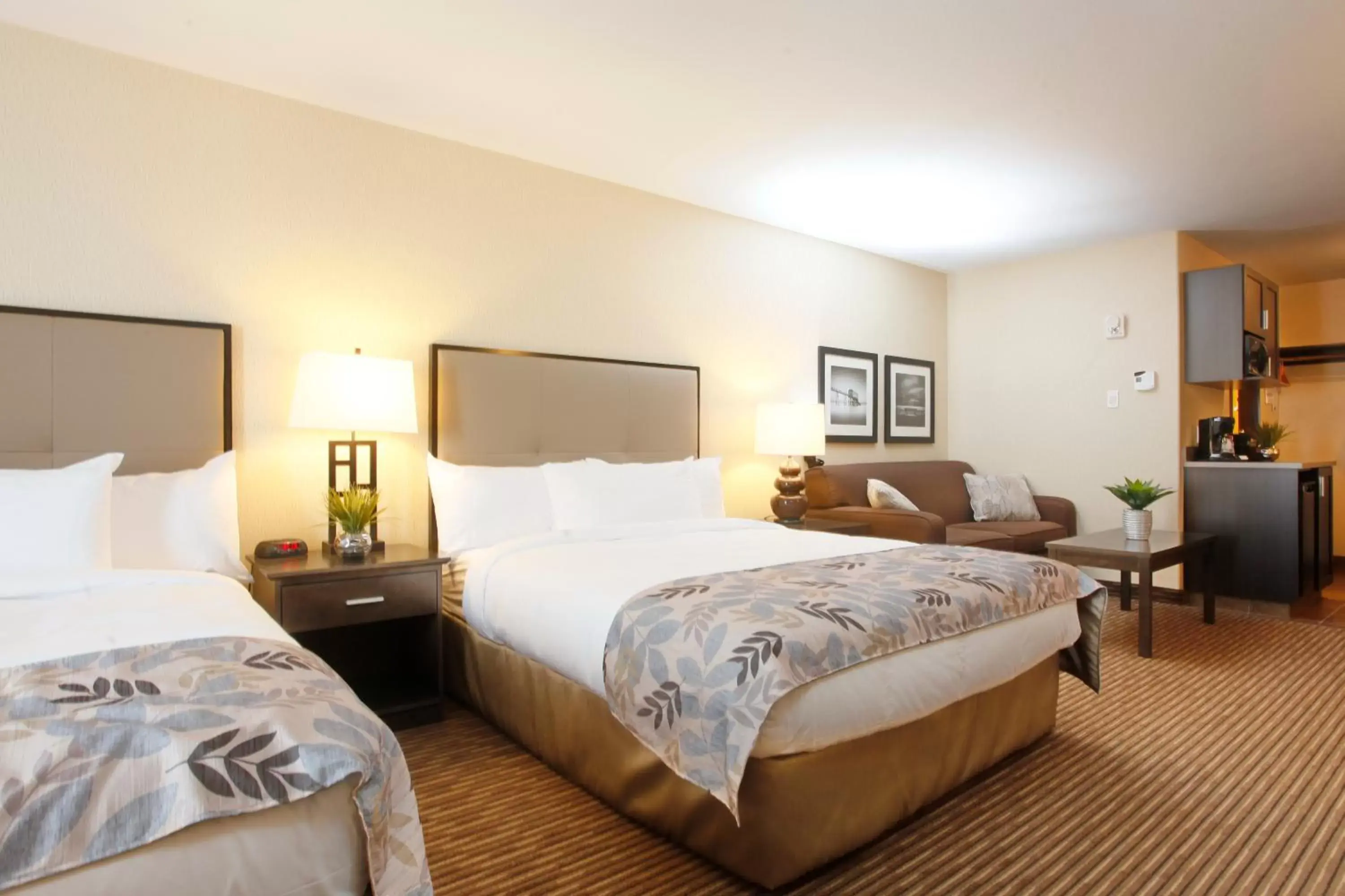 Bedroom, Bed in Pomeroy Inn & Suites at Olds College