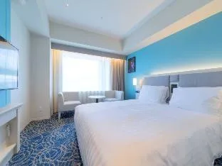 Bed in LIBER HOTEL Osaka