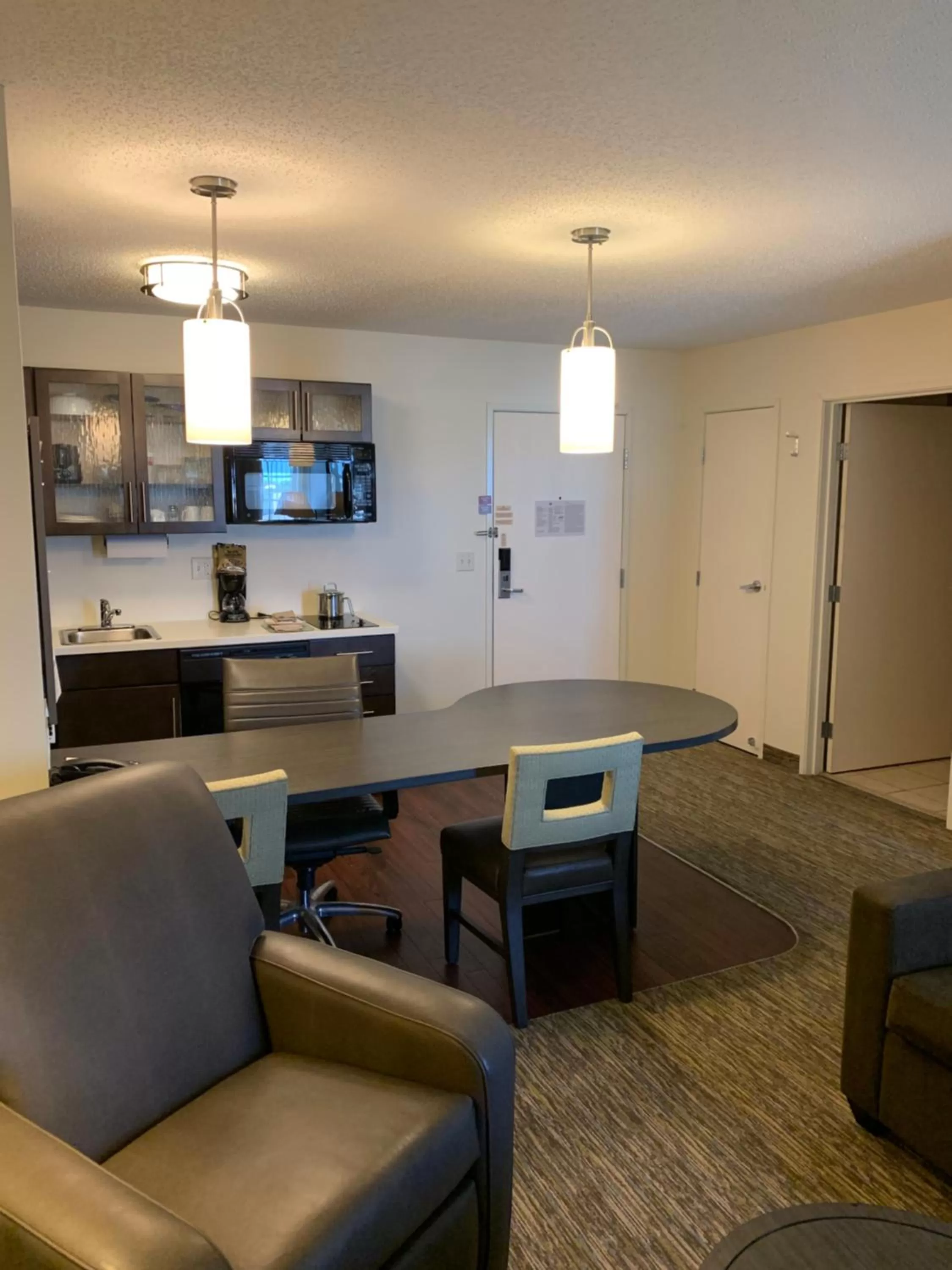 Kitchen or kitchenette in Candlewood Suites Fargo-North Dakota State University by IHG