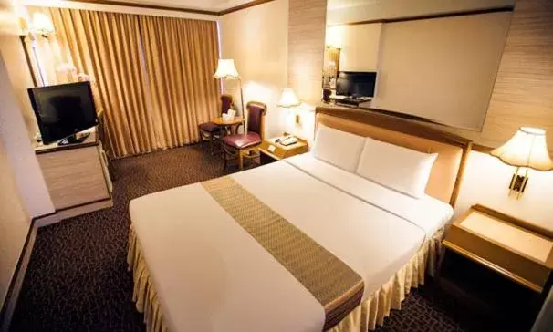 Bed in V.L. Hatyai Hotel