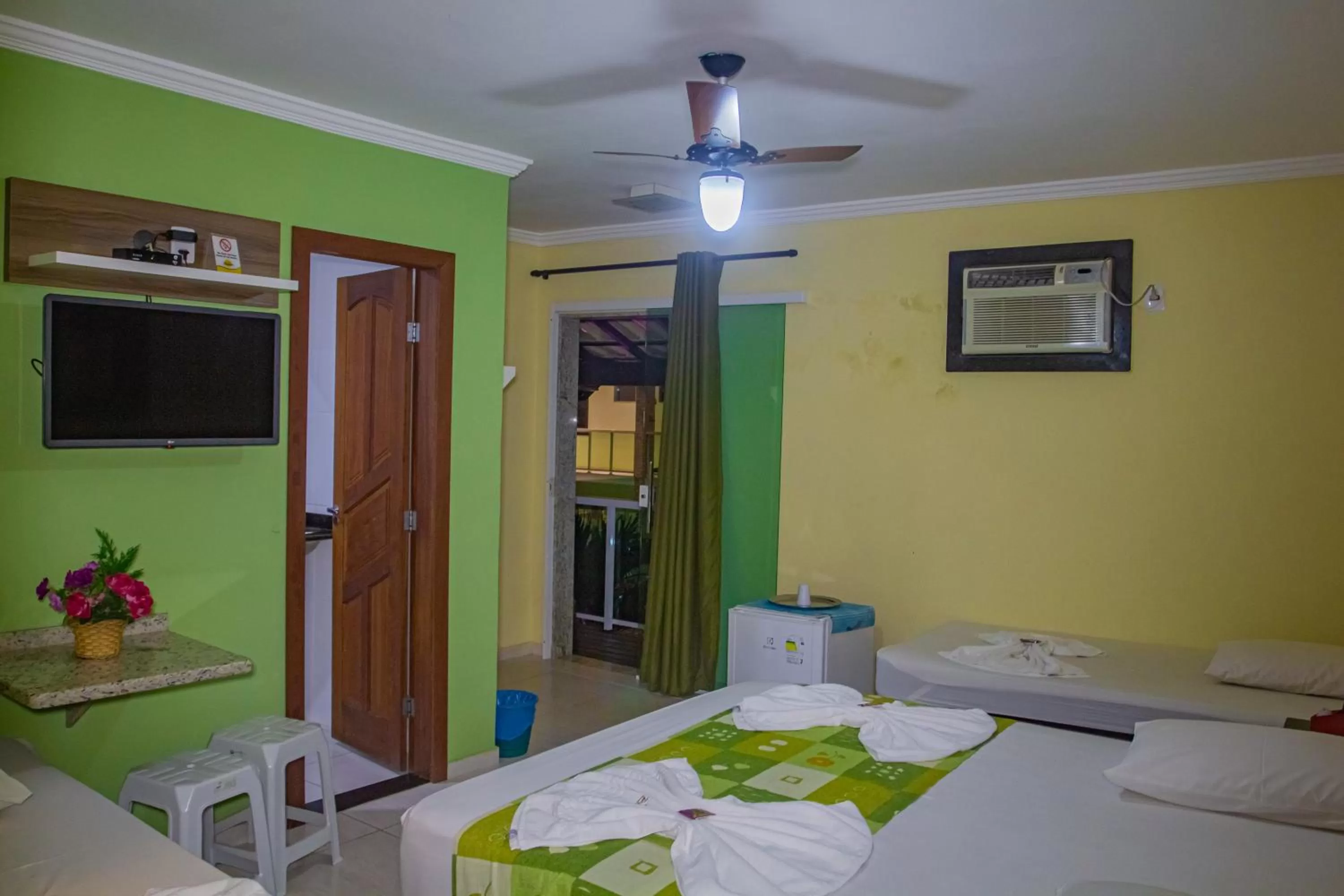 Bed in Pousada Palmares